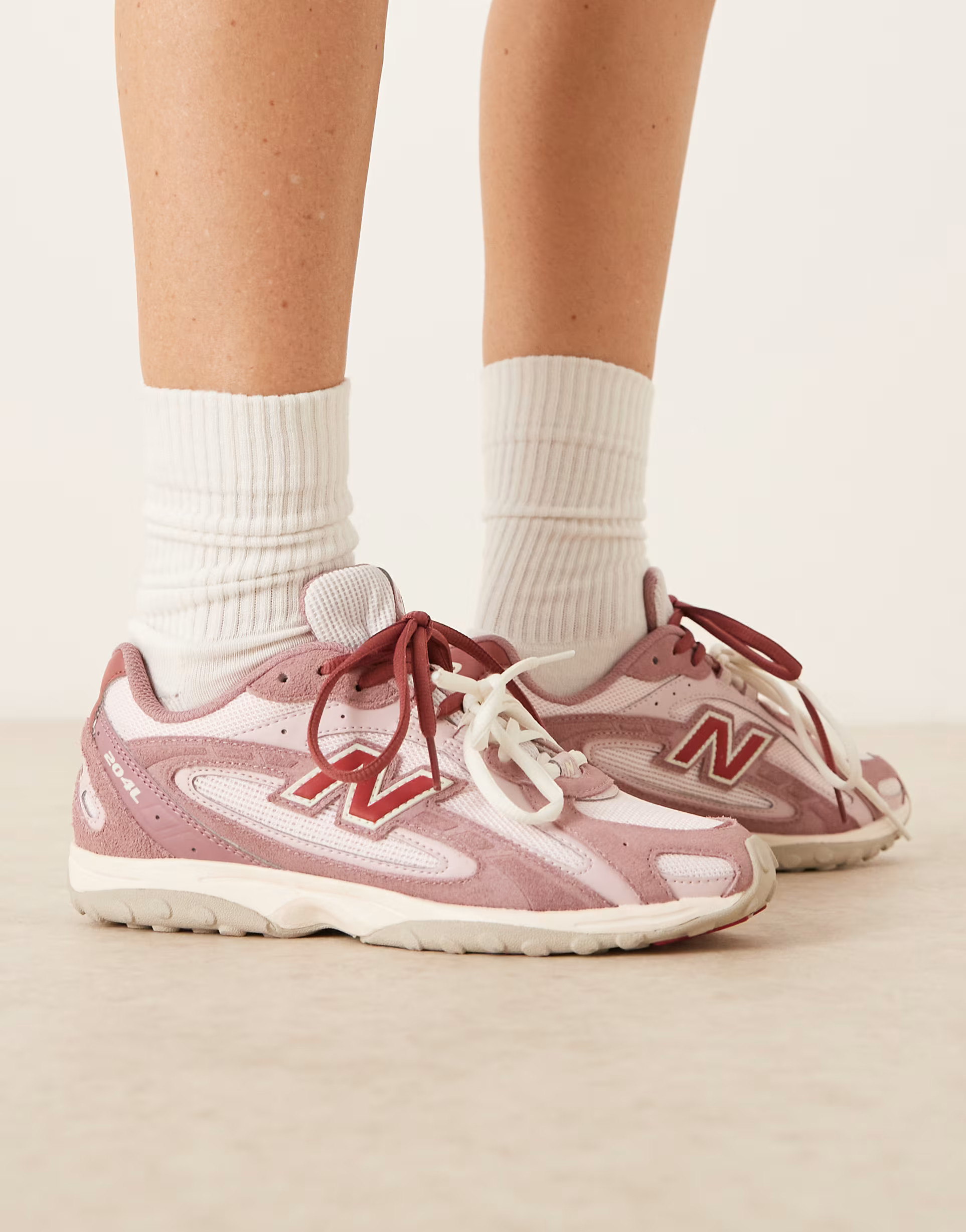 New Balance 204L trainers in rose pink suede | ASOS (Global)