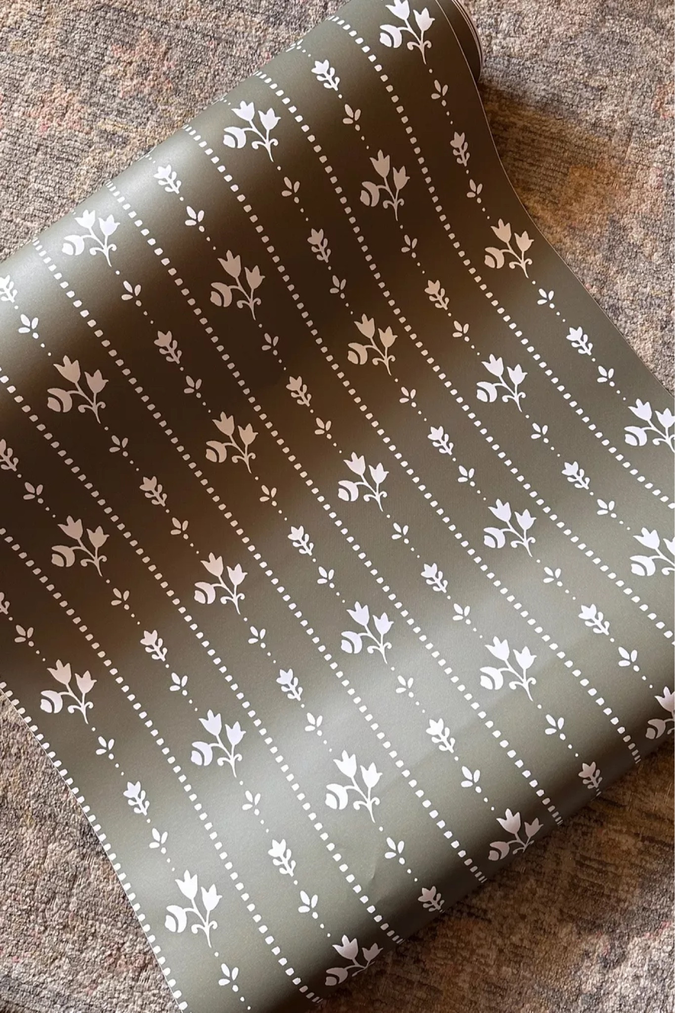 Peel and stick wallpaper that I used in the back of the nursery cabinet

#LTKhome #LTKbaby