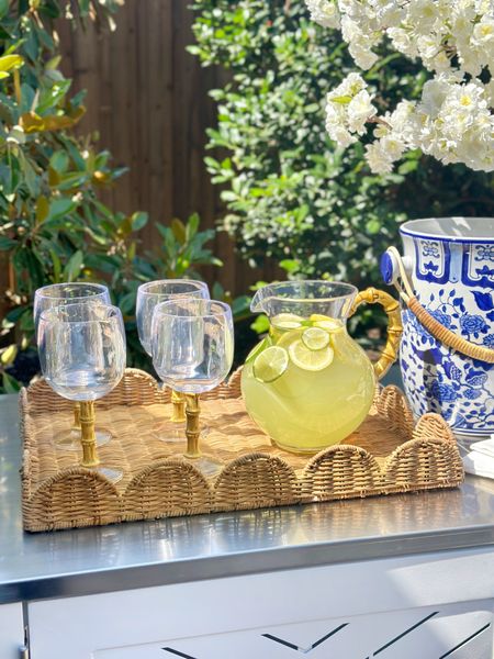 Acrylic bamboo pitcher and goblets, scalloped tray, outdoor decor patio decor outdoor entertaining outdoor styling blue and white ice bucket outdoor console table summer hosting 

#LTKHome #LTKFindsUnder50 #LTKSaleAlert