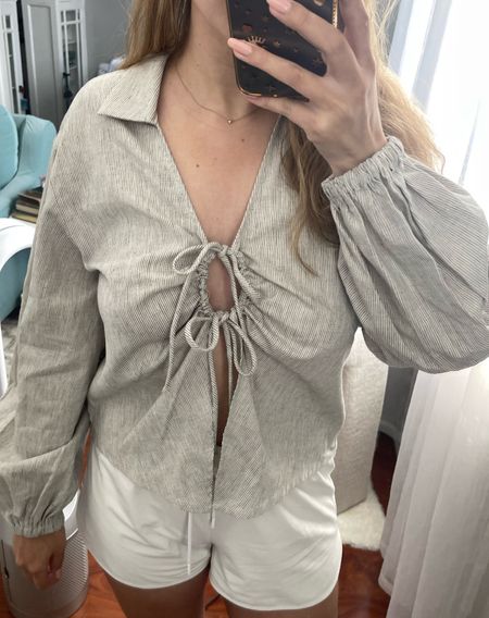 Here's how the Target linen top looks with the keyhole tightened!! I like both ways for different reasons. I am in a small!

Linen top, tie front top, linen shirt, tie front shirt; trendy shirt; summer top, spring top

#LTKfindsunder50 #LTKstyletip #LTKSeasonal