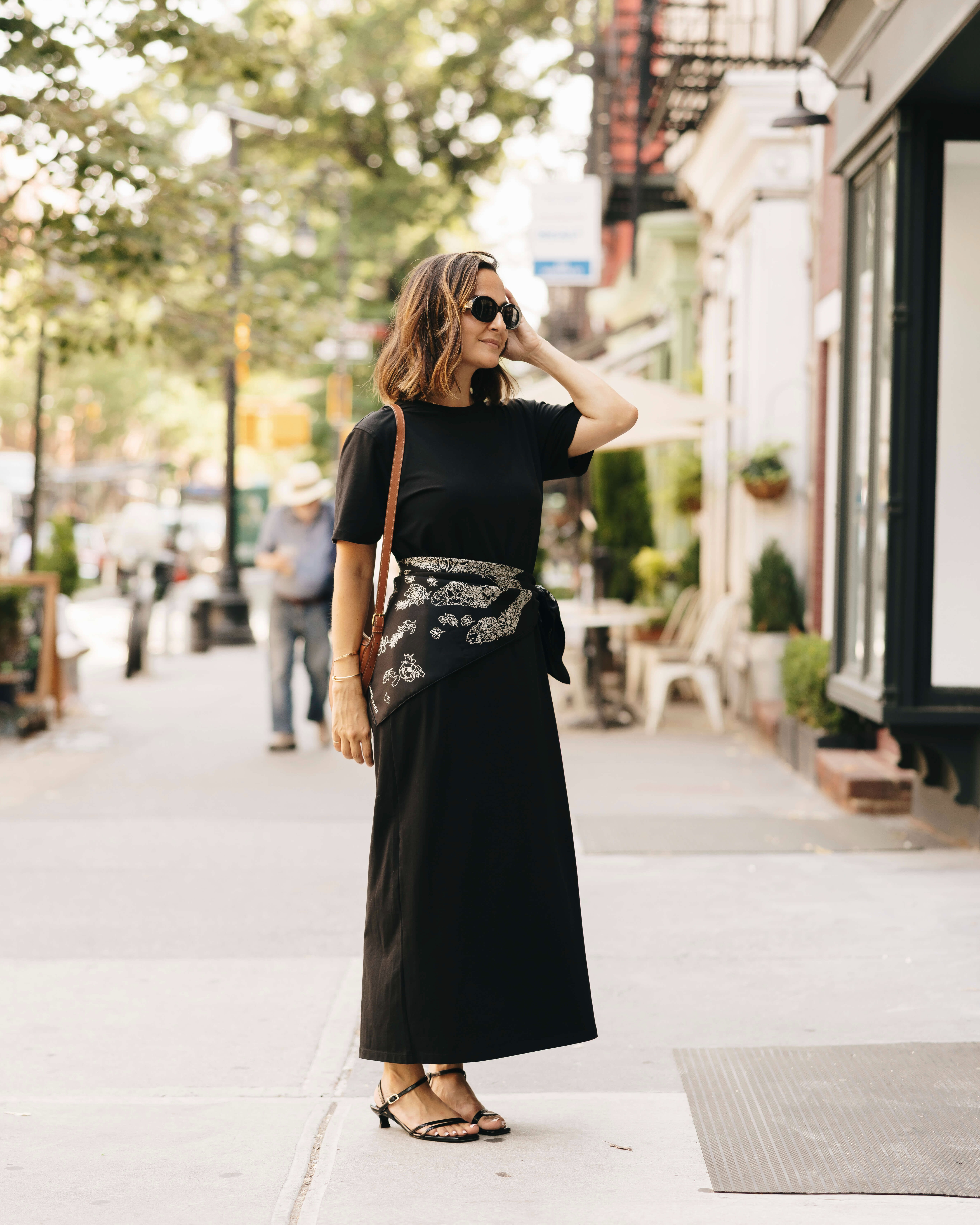 An easy way to make a simple black dress feel completely different! I added a printed silk scarf at the waist, strappy kitten heels, and a classic crossbody for a little more interest. Such an easy styling trick that instantly gives a closet staple a fresh look!  

 #LTKootd #LTKSeasonal