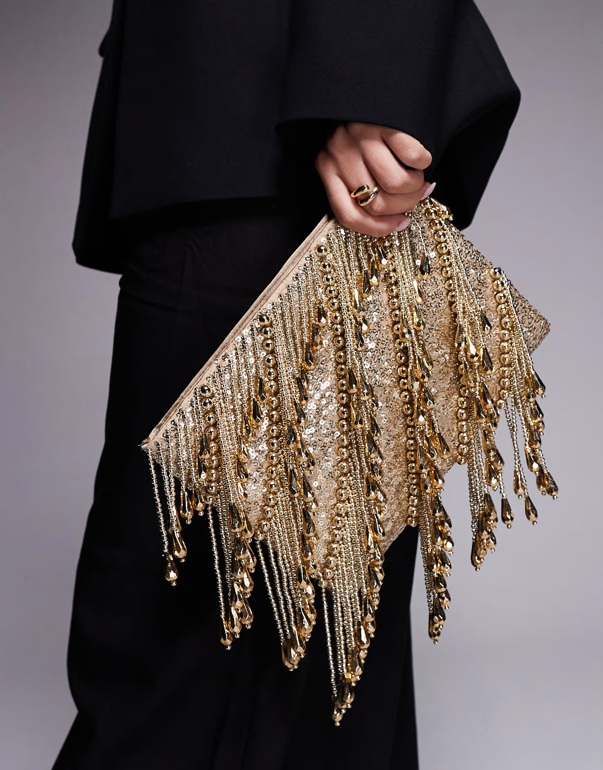 ASOS DESIGN droplet zip top clutch bag in gold | ASOS (Global)