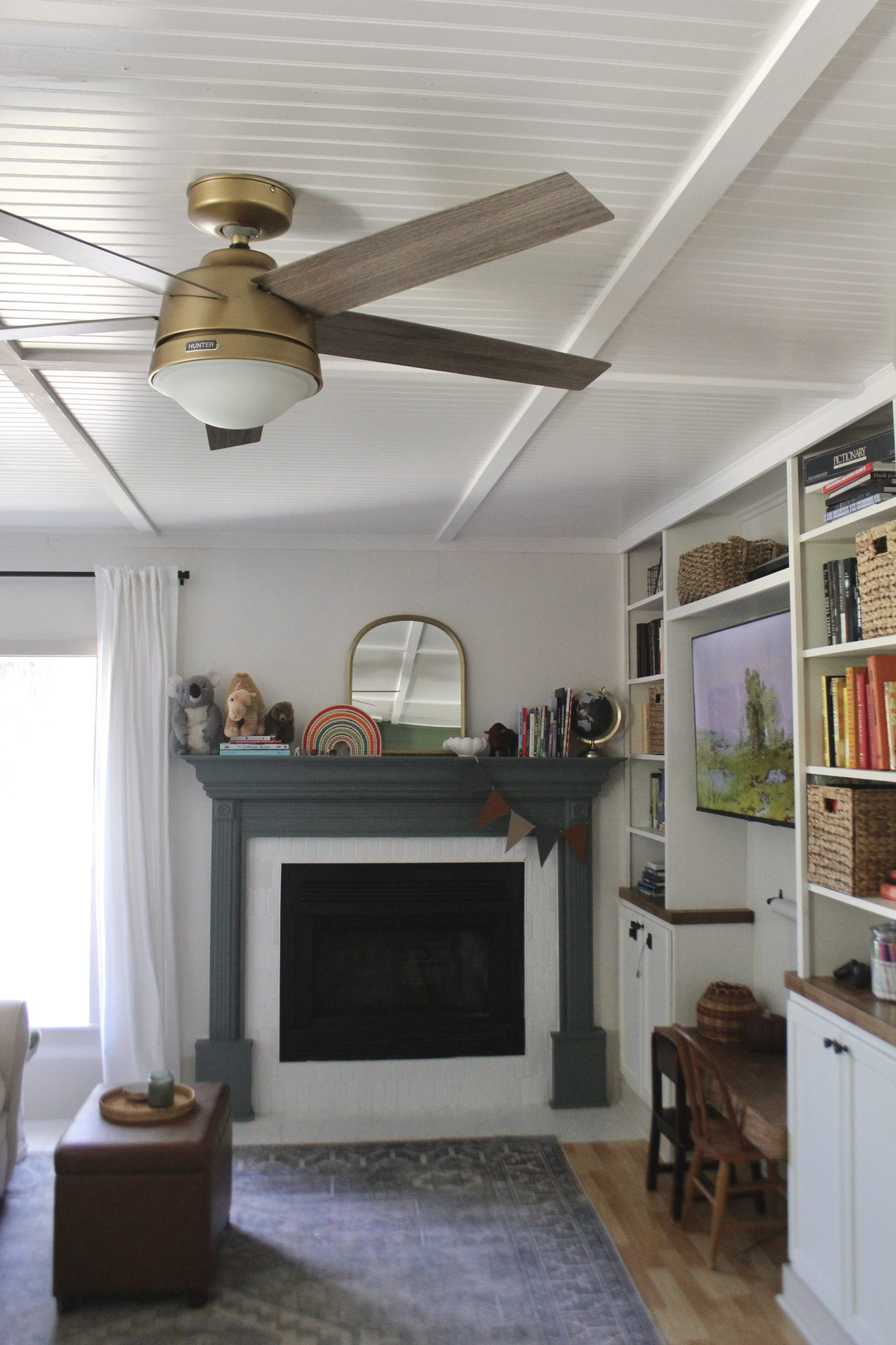 Our budget-friendly playroom makeover was all about fun, functional decor with loads of personality! The gallery wall adds color and charm, while the sleek arched mirror and stylish ceiling fan keep things fresh and grown-up. It’s the perfect balance of playful and practical—ideal for both kids and adults to enjoy! 

 #LTKHome #LTKKids #LTKFamily