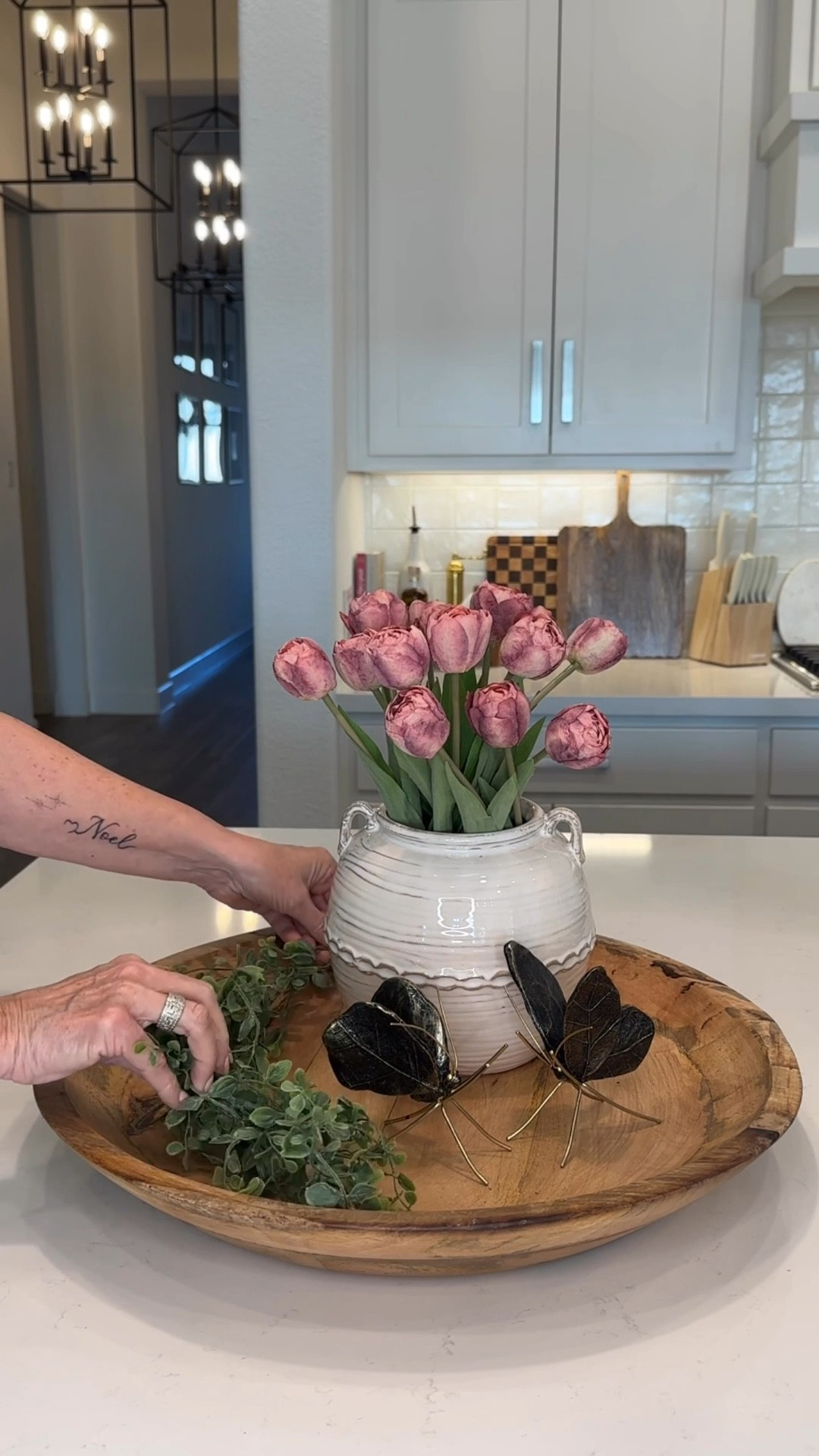 There’s just something about soft pinks, delicate butterflies, and warm wood tones that instantly makes a space feel fresh, light, and so inviting. And the best part? You don’t need much to make a big impact.
I kept this tray simple but intentional—layering a few beautiful pieces to create that effortless, collected look we all love for spring.
Save this for when you’re ready to refresh your space… and tell me—are you decorating yet or waiting a little longer?

#LTKHome