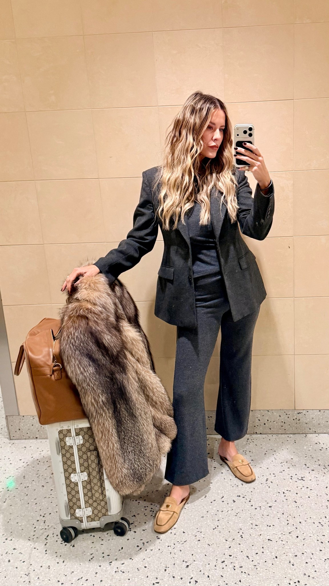 Travel fit for our 10 hour flight to London! This grey set is so comfy….and while I wouldn’t encourage wearing pajamas in public…I did sleep in these lol & jazzed them up with a blazer & sude flats! Wearing a small in the grey set & medium in blazer (which has a removable fur collar!)

#LTKFindsUnder100 #LTKTravel #LTKootd