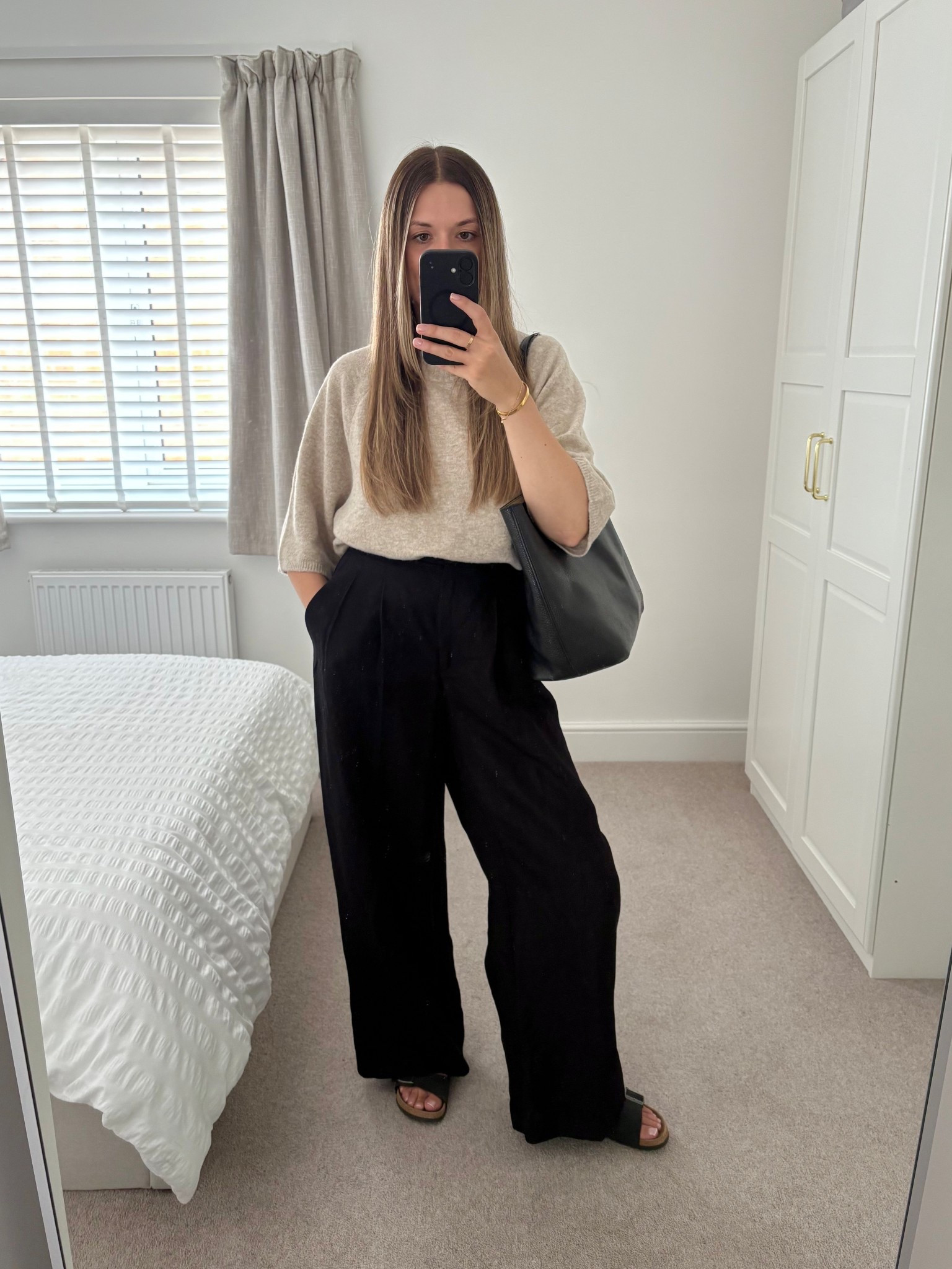 A back to work outfit 🖤

Short sleeve knit jumper (I wear size small), black tailored trousers, black Birkenstocks and a black leather tote bag. 

#LTKuk #LTKautumn #LTKstyletip