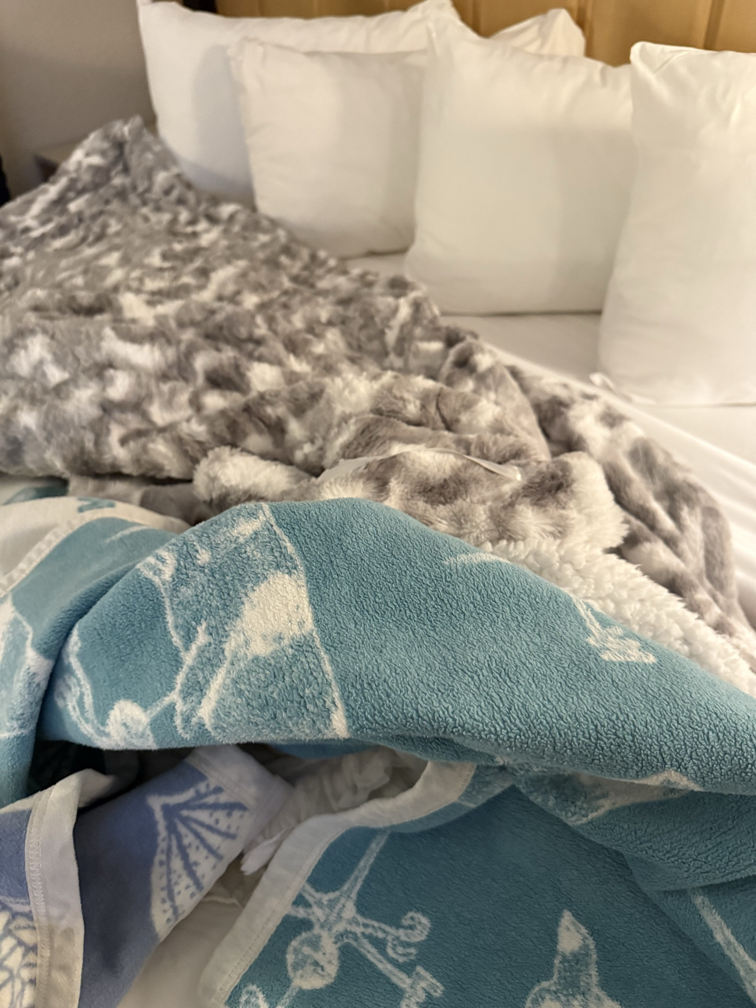 My cozy bed set up. I love all the throw blankets. 

#LTKHome #LTKmorningroutine #LTKPetite