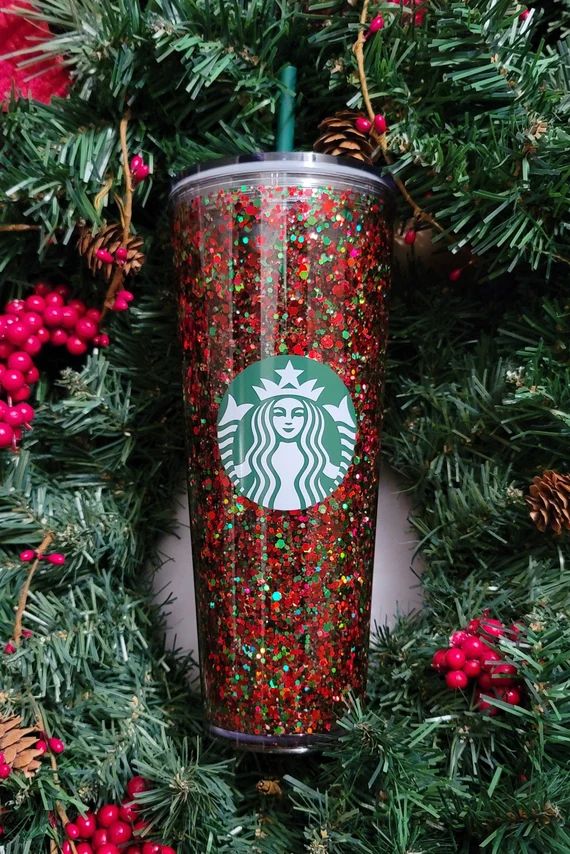 Read the full title
    Holly Starbucks snowglobe tumbler | Etsy (US)
