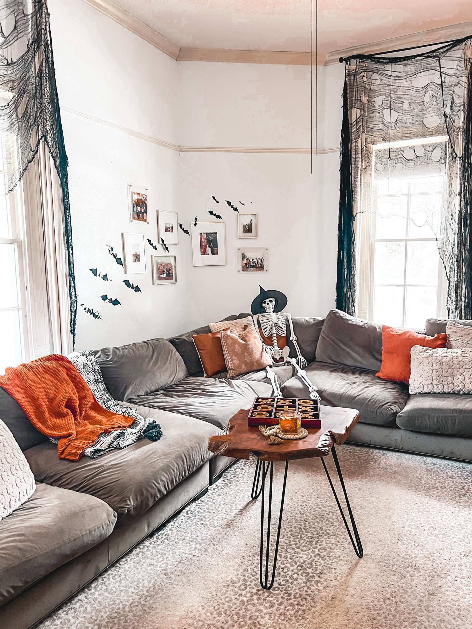 Halloween decor skeleton witch hats rust orange pillows fall decor