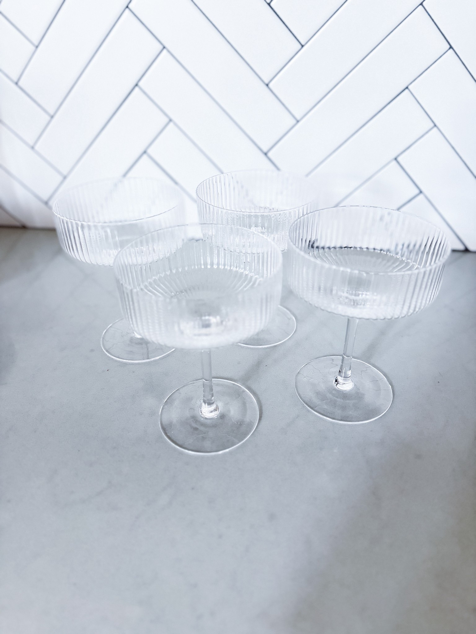 The most beautiful coupe glasses have arrived & I am obsessed. We are officially upping our martini game with these Modern Optic Coupe Glasses from Williams Sonoma. The ribbed detailing catches the light perfectly & they look so stunning on the counter. 

ribbed coupe glasses - champagne coupe - cocktail glasses - barware - Williams Sonoma drinkware - kitchen essentials - entertaining must haves - home bar - glassware set - coupe champagne flutes - ribbed glassware - cocktail hour - hostess gift ideas - kitchen finds - martini glasses - martini night - espresso martini glasses - date night at home - girls night inspo - new year entertaining - champagne toast - fancy glassware - stemware - cocktail aesthetic - bar cart essentials - mixology - aperol spritz - cosmopolitan cocktail - french martini - entertaining at home - dinner party inspo - tablescape - drinkware obsessed - kitchen upgrade - Williams Sonoma finds - luxury for less - home entertaining​​​​​​​​​​​​​​​​

#LTKdayinmylife #LTKfoodie #LTKHome