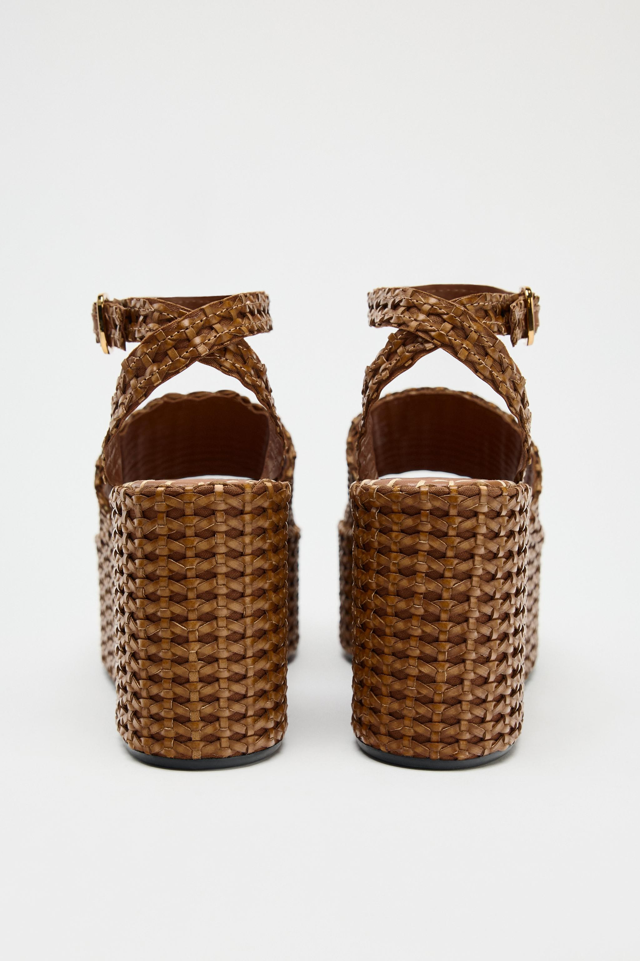 Braided platform wedge shoes. Front strap. Ankle strap with buckle closure. Platform sole. Rounde... | Zara US