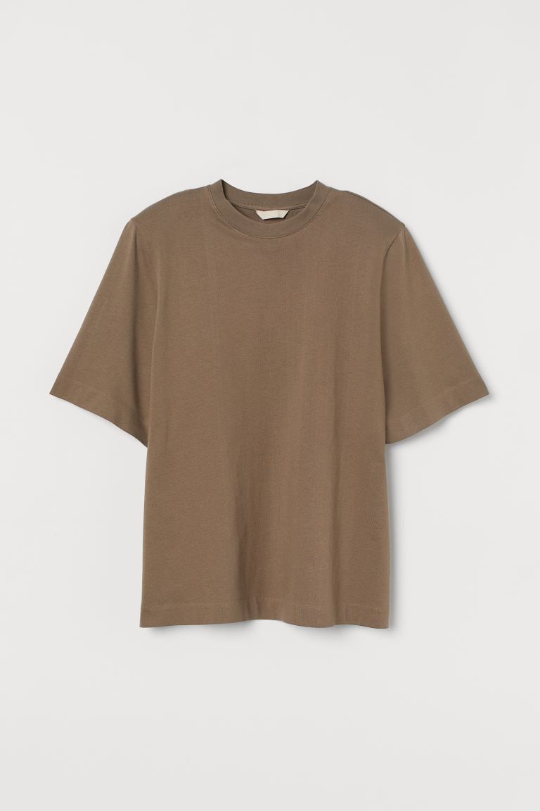 T-Shirt mit Schulterpolstern | H&M (DE, AT, CH, NL, FI)