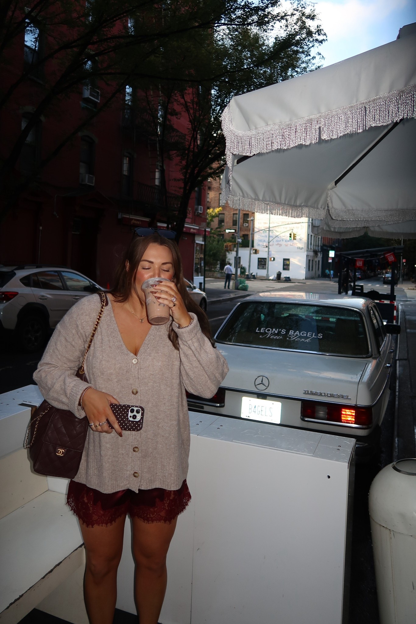 curvy midsize fall outfit! wearing size xl in cardigan for a looser fit and size xl in burgundy lace silk  shorts 

#LTKMidsize #LTKTravel #LTKSeasonal