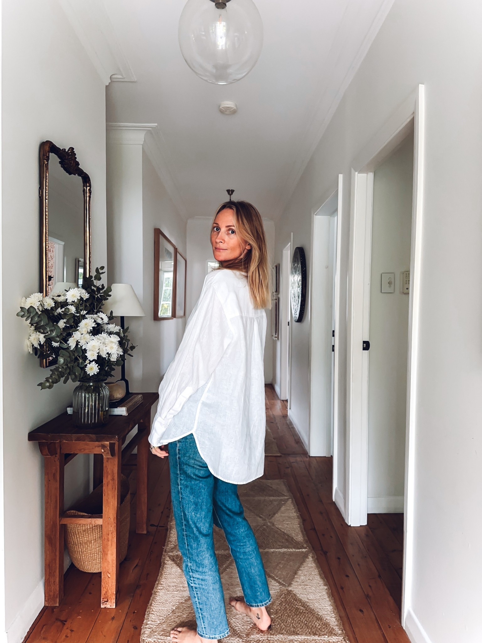 The classic boyfriend linen shirt—effortlessly cool and slightly oversized. I'm wearing a size 8 for that relaxed, lived-in look.

#LTKnewzealand #LTKaustralia #LTKautumn