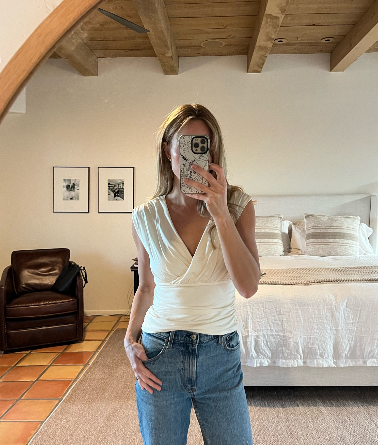 Abercrombie & Fitch ruched v-neck top - wearing size small. 
 
Dress it up or down, comes in black or cream, very flattering top! Paired with a&f jeans (size 27)

#LTKStyleTip #LTKFindsUnder100 #LTKFindsUnder50