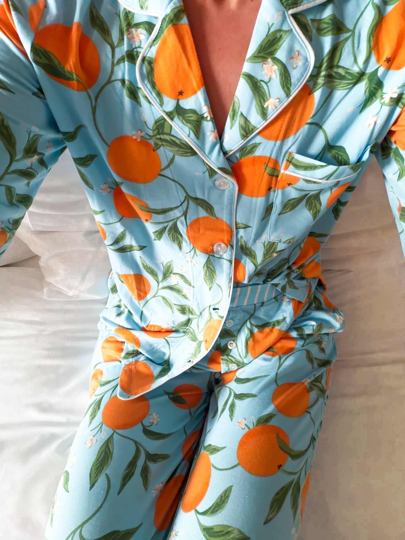 Matching orange print pajama set in XS - could size down if in-between. Has pockets and stretchy waistband. Comes with matching eye mask. Functional buttons. I packed these for Europe! Matching pajama sets.

#LTKootd #LTKgrwm #LTKmorningroutine