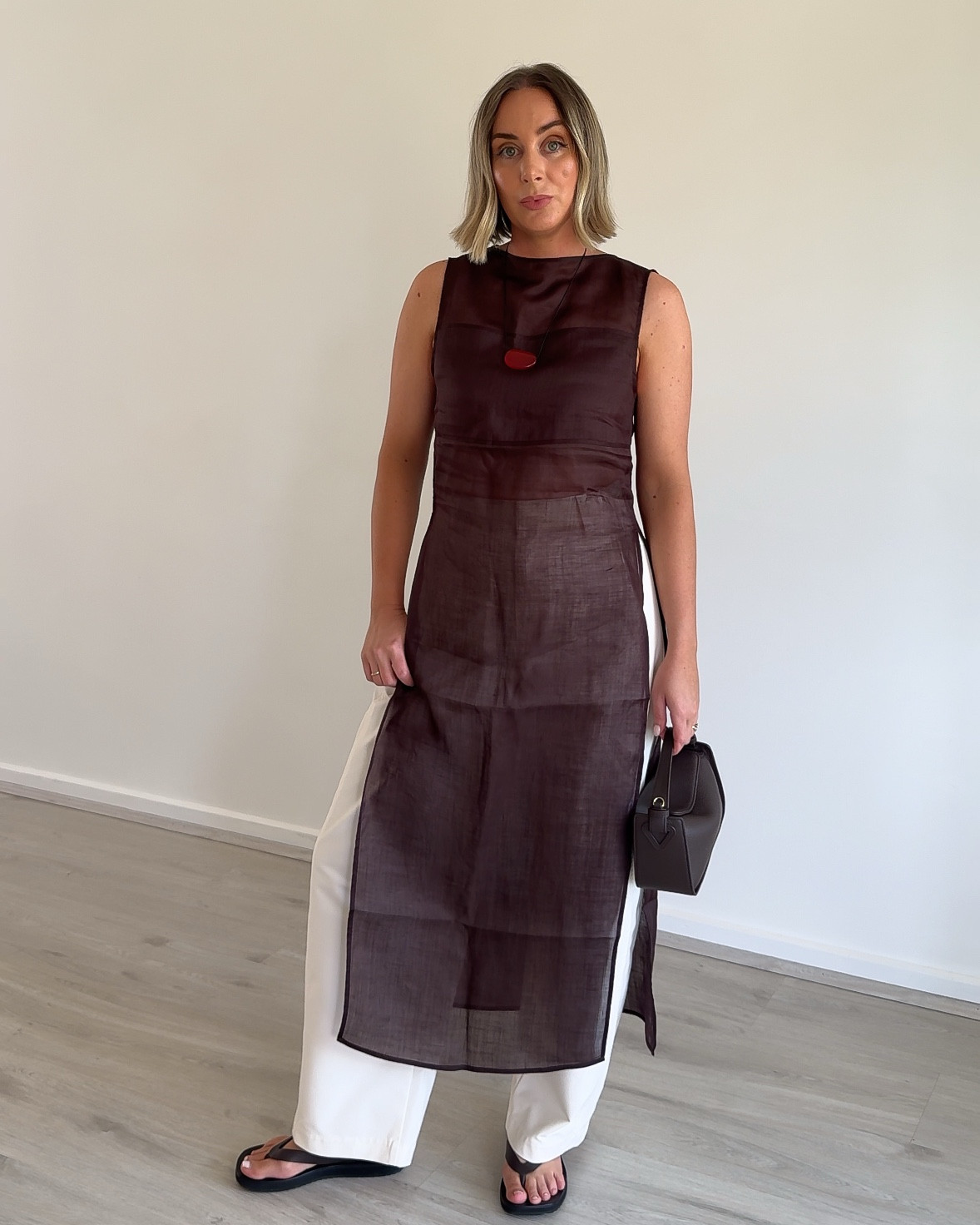 Wearing - 

Outfit 1 
Sheer top by Dissh
Bag by The Horse
Barrel leg trousers by Uniqlo
Sandals by Tony Bianco

Outfit 2
Sheer top by H&M
Bag by H&M
Jeans by Assembly Label
Red thongs by Tkees

Outfit 3
Top by VRG Girl
Bag by The Horse
Pants by H&M
Sandals by Tony Bianco

Outfit 4
Tank & sheer skirt by Capsule WD (to be purchased on their website)
Necklace by Gem Totem (to be purchased on their website)

Outfit 5
Dress by Dissh
Bag by The Horse
Sequin skirt by VRG Girl
Heels by Tony Bianco (sold out)

Outfit 6
Sheer lace dress by VRG Girl
Necklace by Heaven Mayhem
Pants by Assembly Label
Red thongs by Tkees

Outfit 7
Shirt by Dissh
Bag by The Horse
Sequin skirt by VRG Girl
Thongs by Seed

Outfit 8
Set by H&M
Bag by H&M
Red thongs by Tkees

Outfit 9
Dress by Dissh
Necklace by Heaven Mayhem
Sandals by Alias Mae

#LTKsummer #LTKfestive #LTKaustralia