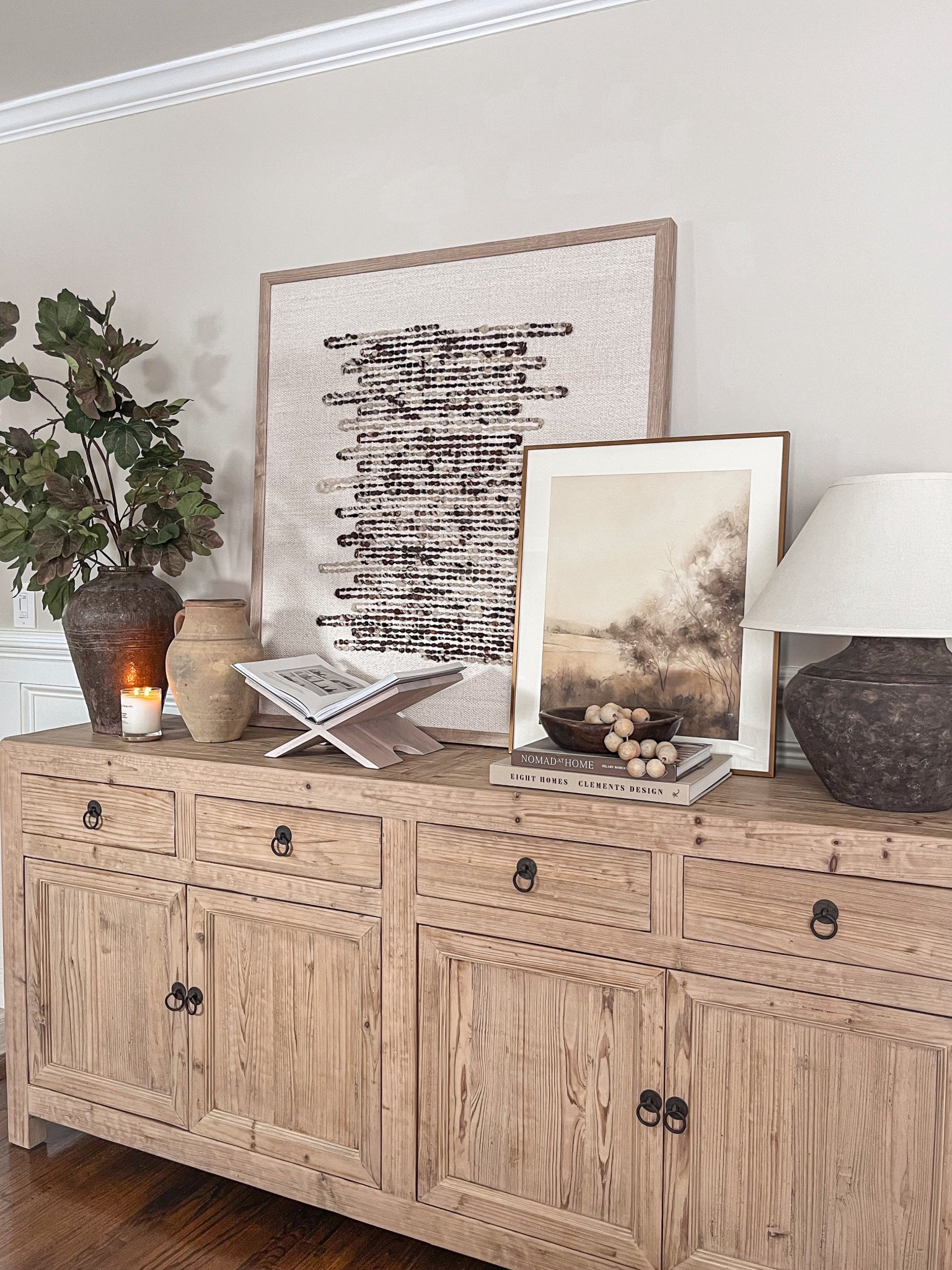 
A little sideboard refresh to warm up this space, styled with a few of my favorite vintage collected pieces and textured art.🤌🏻

#LTKHome #LTKstorytime #LTKSeasonal