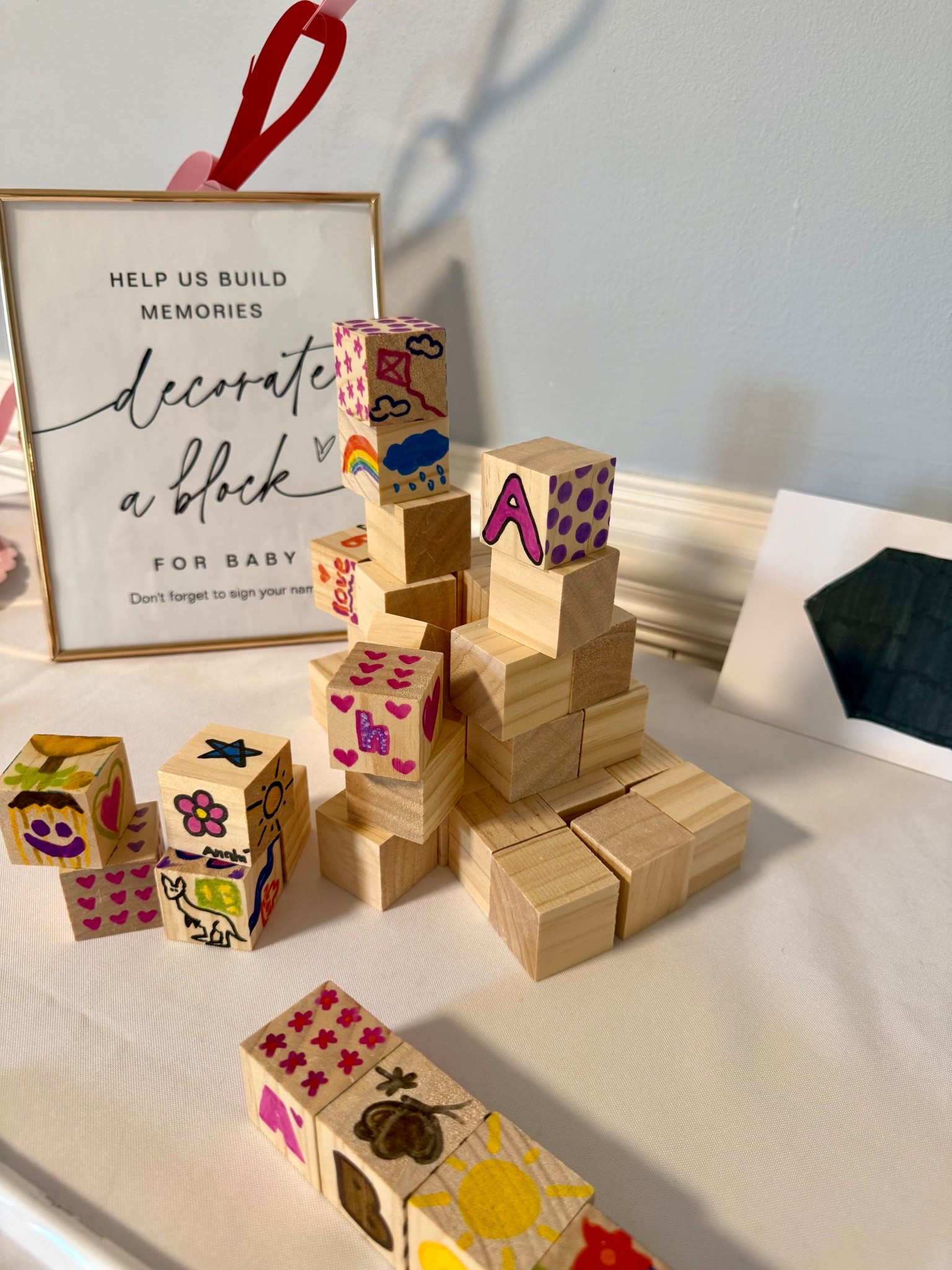 Baby shower activity: decorate a baby block #babyshower #babyshoweridea 

#LTKBump #LTKmomlife #LTKBaby