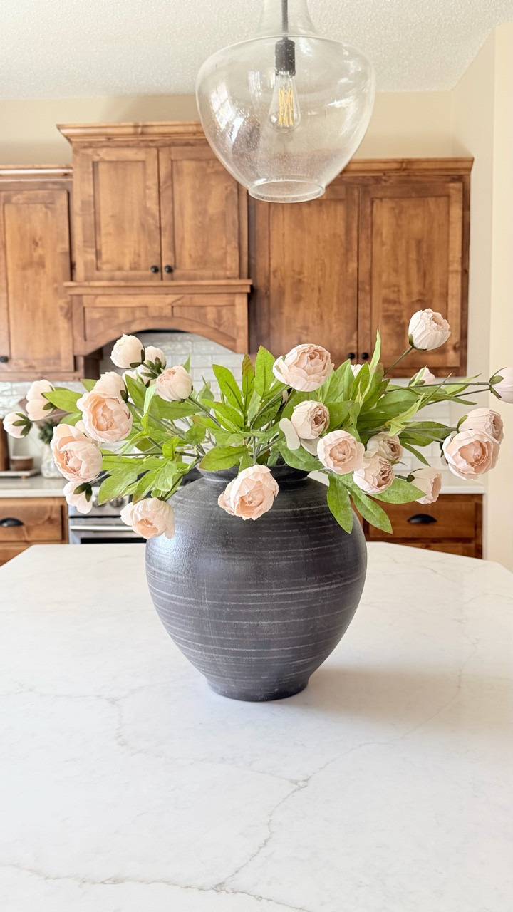 A single large statement vase, a handful of peonies, and suddenly the whole kitchen feels elevated. 

Soft, intentional, and quietly luxurious. 🤍

✨ If you see something you like throughout my home, my items are linked at the top of my page in my bio. 

Quiet luxury, kitchen decor, island styling, elevated home, peonies, faux stems, spring decor, summer decor, intentional living, cozy home

#LTKHome #LTKSeasonal #LTKMothersDay