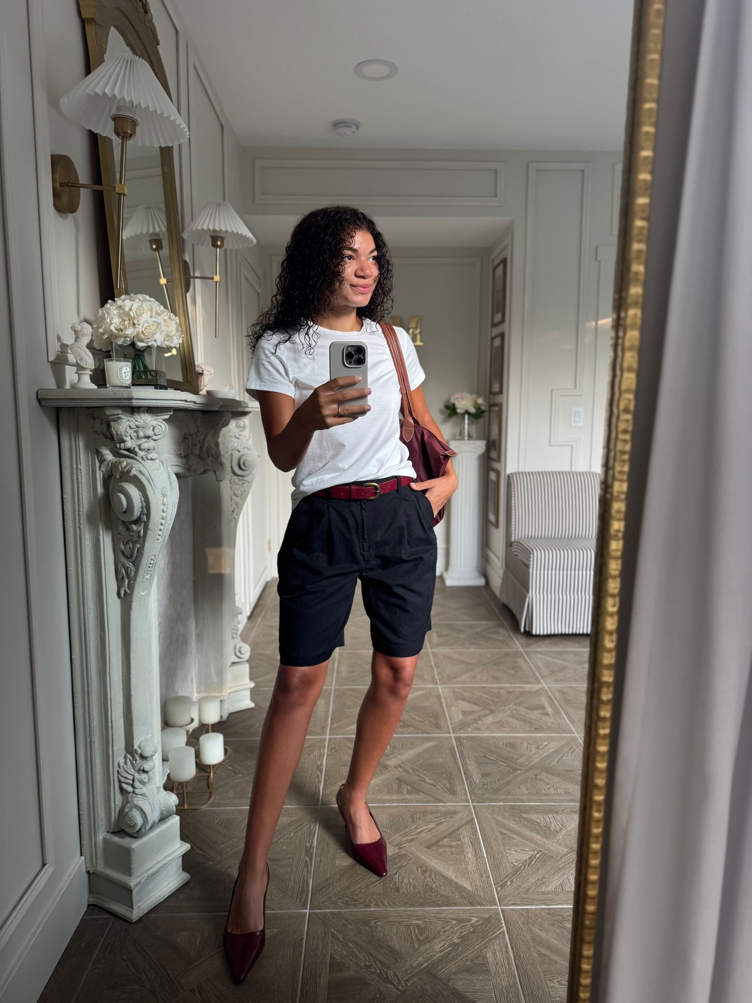 Business casual outfit idea for fall: white t-shirt, black trouser shorts, burgundy slingback heels, burgundy belt, and burgundy bag

#LTKStyleTip #LTKWorkwear #LTKSeasonal