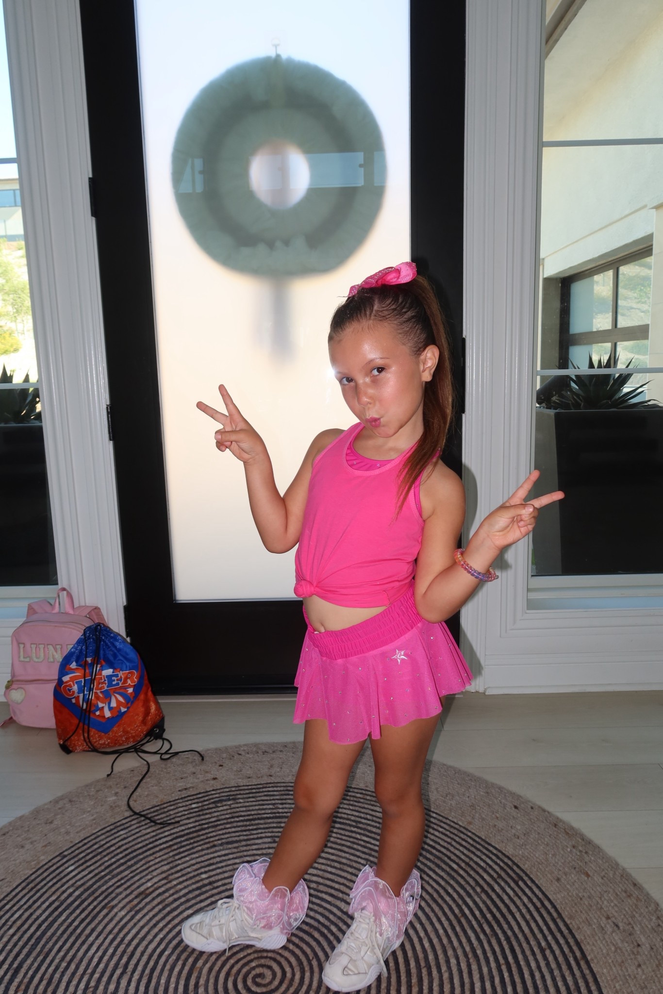 Luna’s Cheer Camp #OOTD - Luna’s obsession has always been pink, sparkles and glitter!!! Obsessed with all of these cheer pieces (don’t worry we snagged other colors for both mila and her to mix and match with too)!!😍👏🏼💕 sizing runs on the smaller size, so we love sizing up one!! Xx 💫  #cheerleading #toddlerootd #toddlerstyle #girlsstyle #activewear 