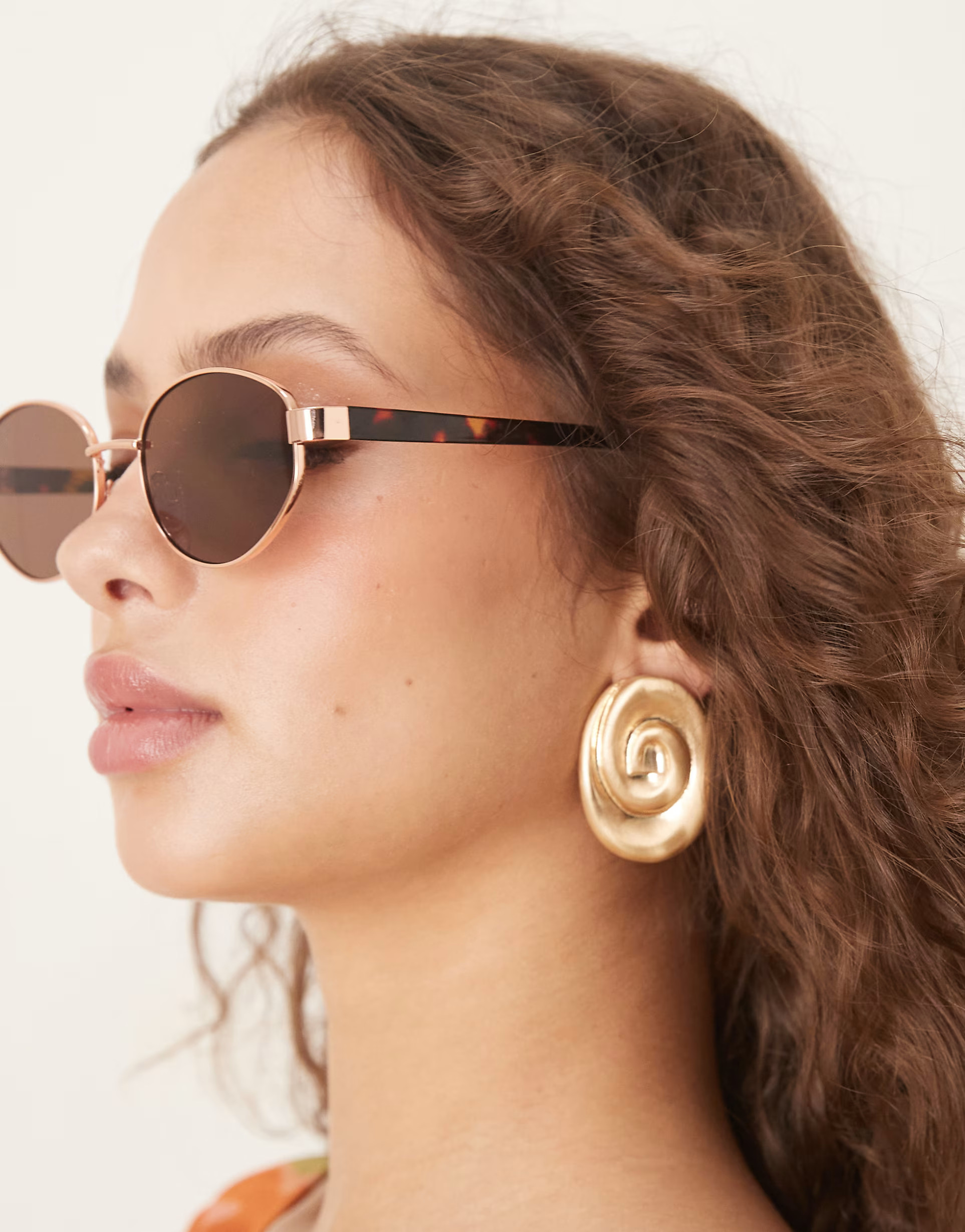 ASOS DESIGN metal oval sunglasses in rose gold with tort arms | ASOS (Global)
