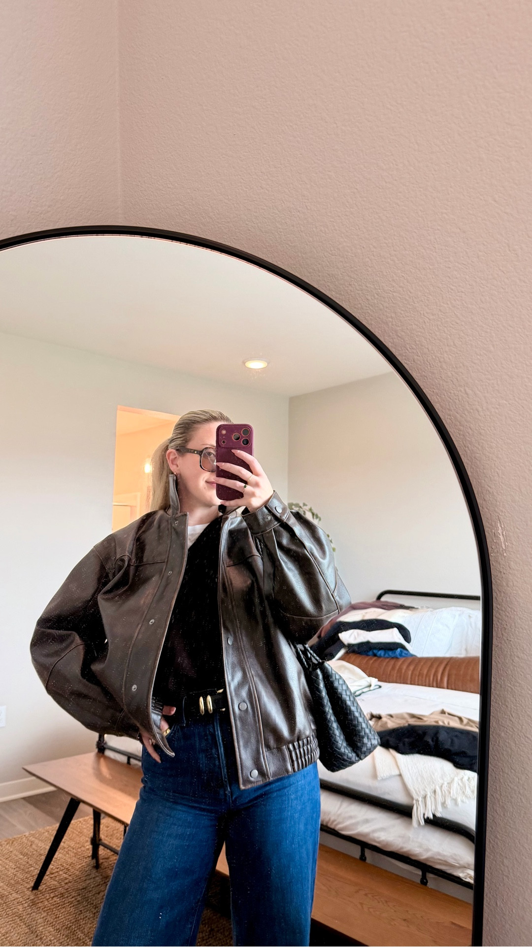 cool girl basics that always hit

the formula for an effortless outfit ↓
a crisp white tee, wide cuffed denim, and a faux leather bomber — casual, minimal, and always pulled together.
easy, wearable, and quietly confident. 🖤

	•	everlane box tee (white)
	•	favorite daughter wide leg cuffed jeans (dark wash)
	•	favorite daughter belt
	•	anthropologie oversized faux leather bomber jacket
	•	anthropologie light lens sunglasses
	•	quince black italian leather bag
	•	dolce & gabbana light blue eau de toilette


#LTKStyleTip #LTKgrwm #LTKootd