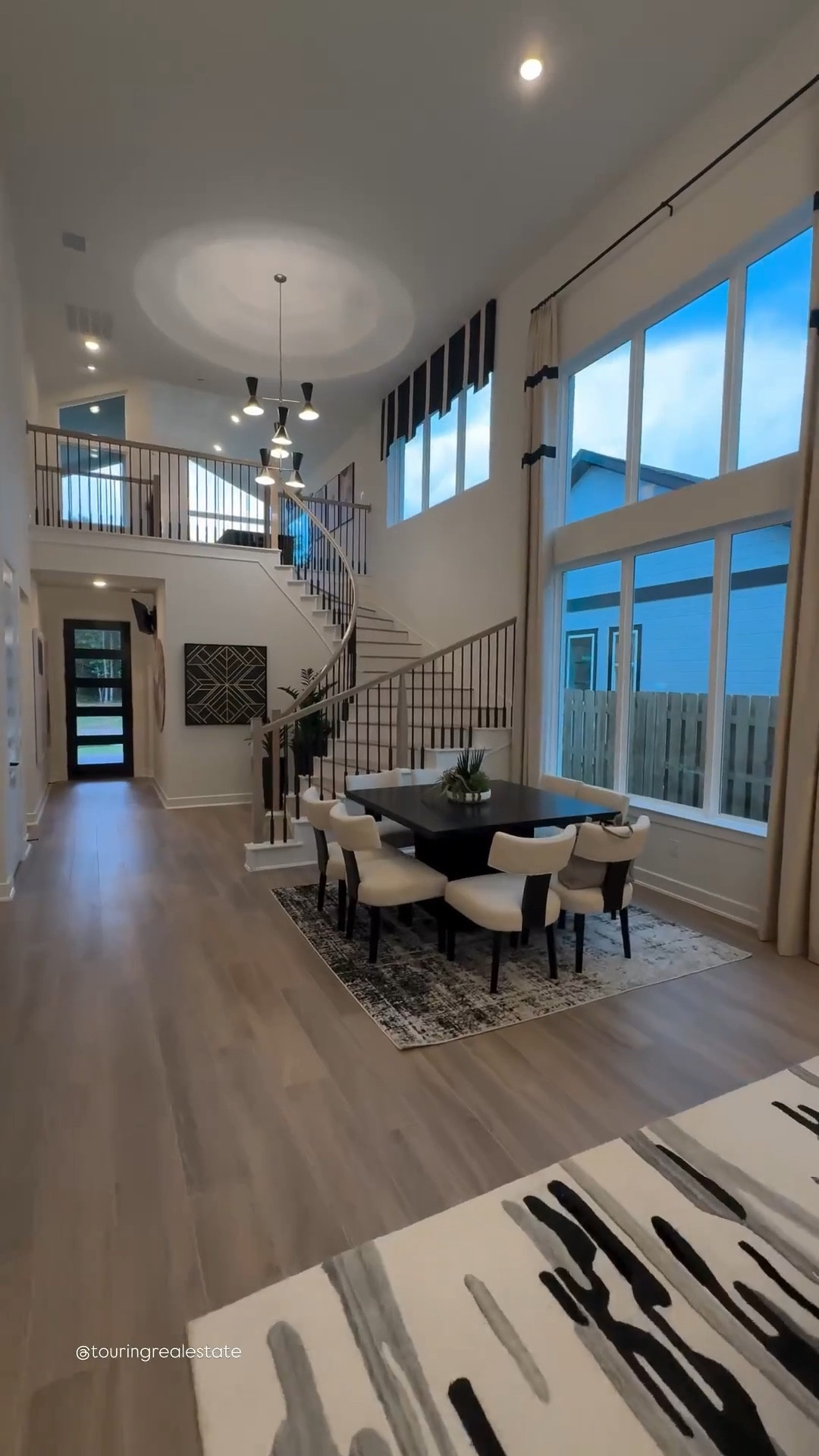 Warning: You’re about to fall in love with every inch of this model home 😍

Stepping inside this Fifth Avenue floor plan by Westin Homes feels like walking into a luxury magazine spread 🖤📸—but it’s real, and it’s right here in Colton, a hidden gem nestled perfectly between Houston and College Station, TX 🤠🏙️. (Yes, Aggie fans…this one’s calling your name! 🎓🐾)

From the moment you enter through the grand two-story rotunda foyer with its dramatic staircase 🌀 to the soaring ceilings and bold, modern light fixtures 💡, this 4 bed, 3 bath masterpiece is giving “wow” on every level. The black + white + neutral color palette is chic, timeless, and oh-so-stylish 🤍🖤🤎.

Let’s talk layout 👉🏾 This open concept floor plan is built for real life and real entertaining. The island kitchen flows effortlessly into the two-story family room and informal dining area 🍽️, with natural light pouring in from every angle ☀️. There’s even a private study for remote work warriors 💼 and a dreamy upstairs game room that’s weekend-ready 🎲🎮

This floor plan in Colton starts at $452,990 🏷️ (Heads up: the model shown includes optional upgrades)

But the showstopper? That spa-inspired primary bath with a soaking tub, dual vanities, and jaw-dropping black brick herringbone flooring 🛁🖤—a design detail I’ve never seen before, and can’t stop thinking about. Oh, and one of the walk-in closets has a secret pass-through to the laundry room! 🧺✨ Genius.

This is new construction at its finest: energy-efficient, low-maintenance, and built to match today’s lifestyle 💪🏾🏡.

⚠️ I’m not affiliated with the builder, just sharing the beauty! So tell me… could you see yourself living here? 💬👇🏾

If you loved this mini tour, send it to someone who dreams in high ceilings and herringbone floors 😍 and hit follow for more luxury model home finds you won’t want to miss! 💫📲

#newbuild #openconcept #dreamhome #highceilings #realestategoals #interiordesign #homedesign #homedecoration #housetour #homedecor #homesweethome #dreamhouse #luxuryhomes #luxuryhomedesign #housegoals #modelhome #luxuryrealestate #modernhomes #modernbathroom #kitcheninspiration

#LTKHome #LTKFindsUnder50 #LTKFindsUnder100