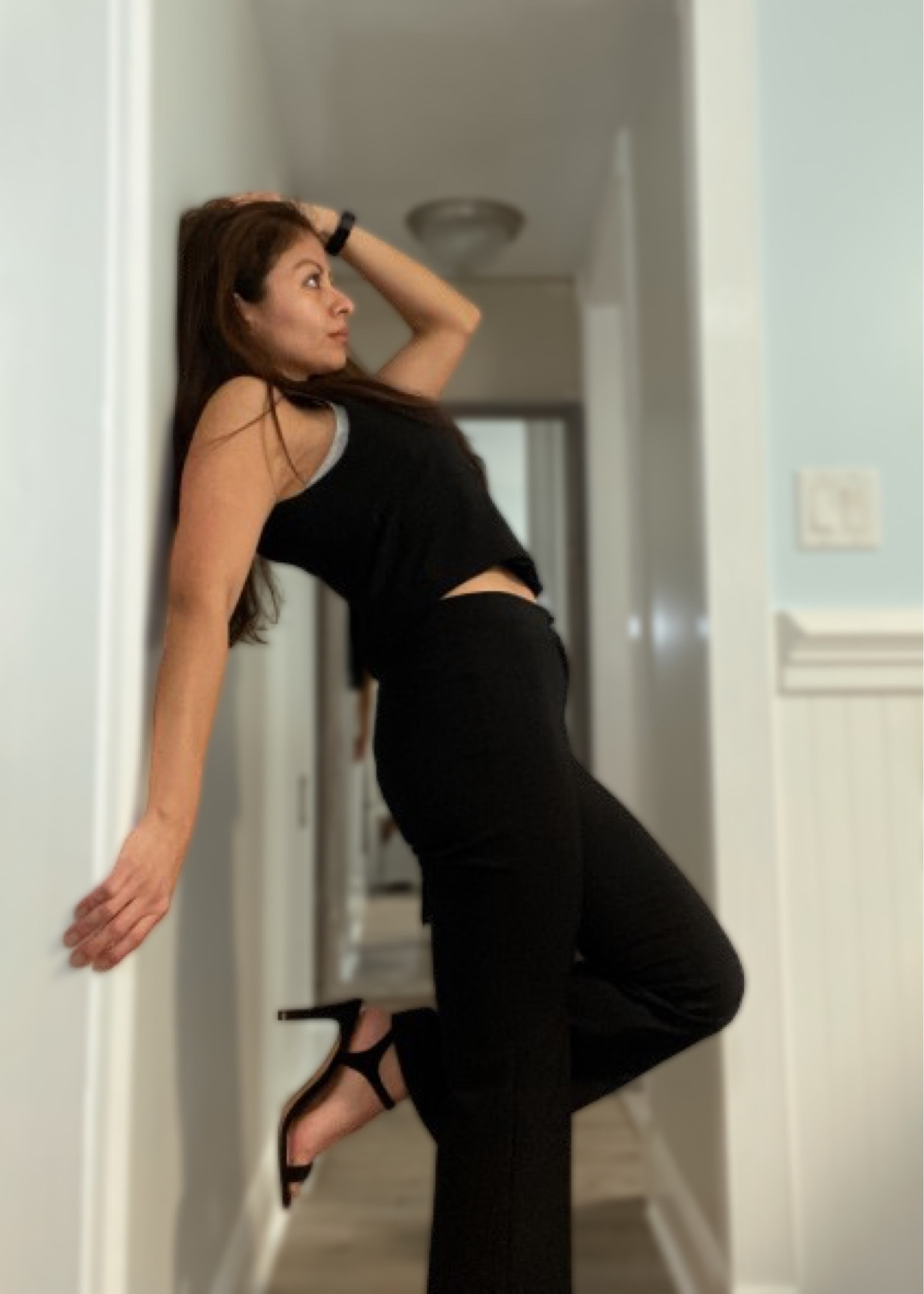 Today I felt like playing the role of Fashion influencer. Here is a picture of today’s outfit: Wearing black vest and black pants with black high heels sandals.
Let me know what you think in the comments. 
Besos, Erika.

#LTKstyletip #LTKshoecrush #LTKwedding