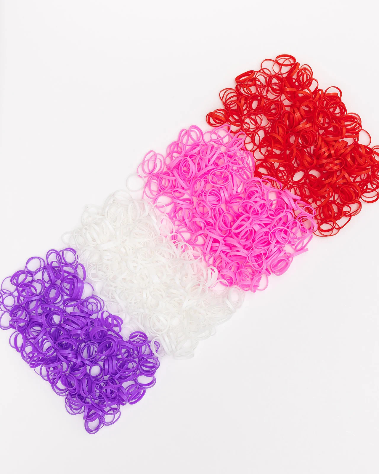 Colored Plastic Elastics: red, purple, white, pink | The Pony Pick