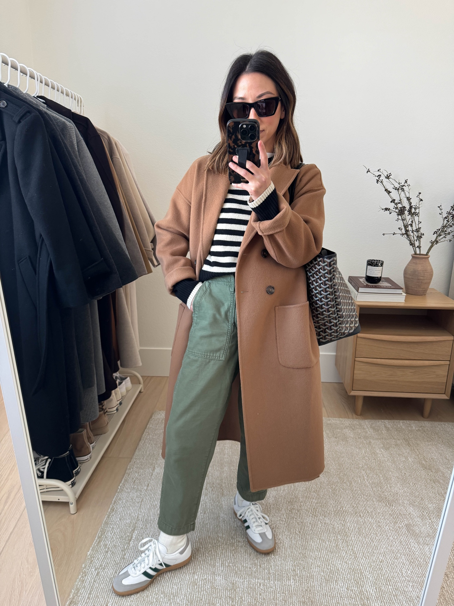 Winter can get a bit depressing when it comes to getting dressed. That's why I put together a winter outfit formula. It saves mental energy, it guarantees polish, it prevents overbuying, and builds consistency. 

Winter outfit formula: 

1. Coat
2. Sweater/Sweatshirt
3. Jeans/Sweats/Lounge/Pants
4. Color Coordinate shoes and bags

Outfit Details

Anine Bing coat xxs
Everlane cashmere sweater xs
Madewell green pants petite 24 (old)
Adidas Samba in green 4 mens
Mansur Gavriel tote
YSL sunglasses 
Dorsey James necklace

#LTKPetite #LTKSeasonal