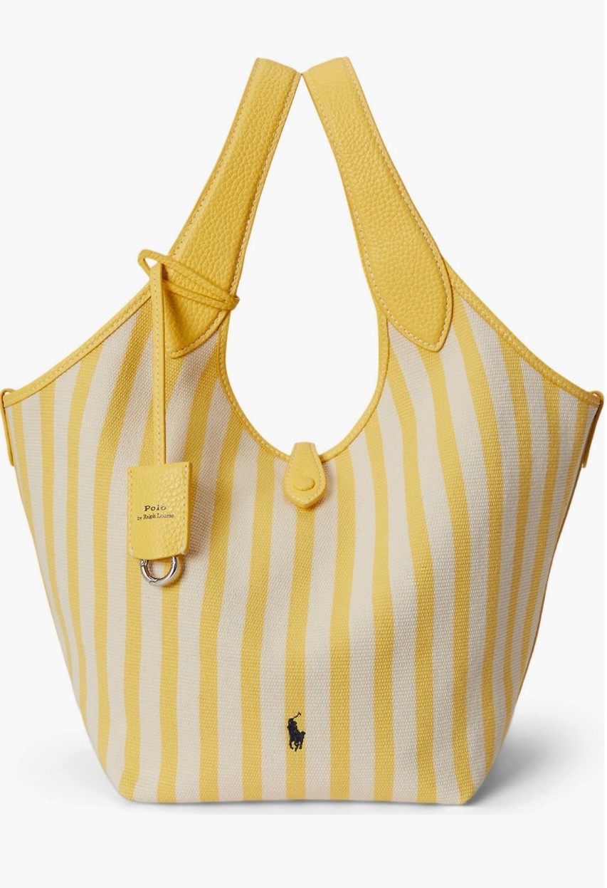 The perfect pop of color 💛
This canvas and leather tote is a great summer bag 
Styled with shorts, denim and a white blouse for a put together outfit 

#LTKOver40 #LTKU #LTKSeasonal