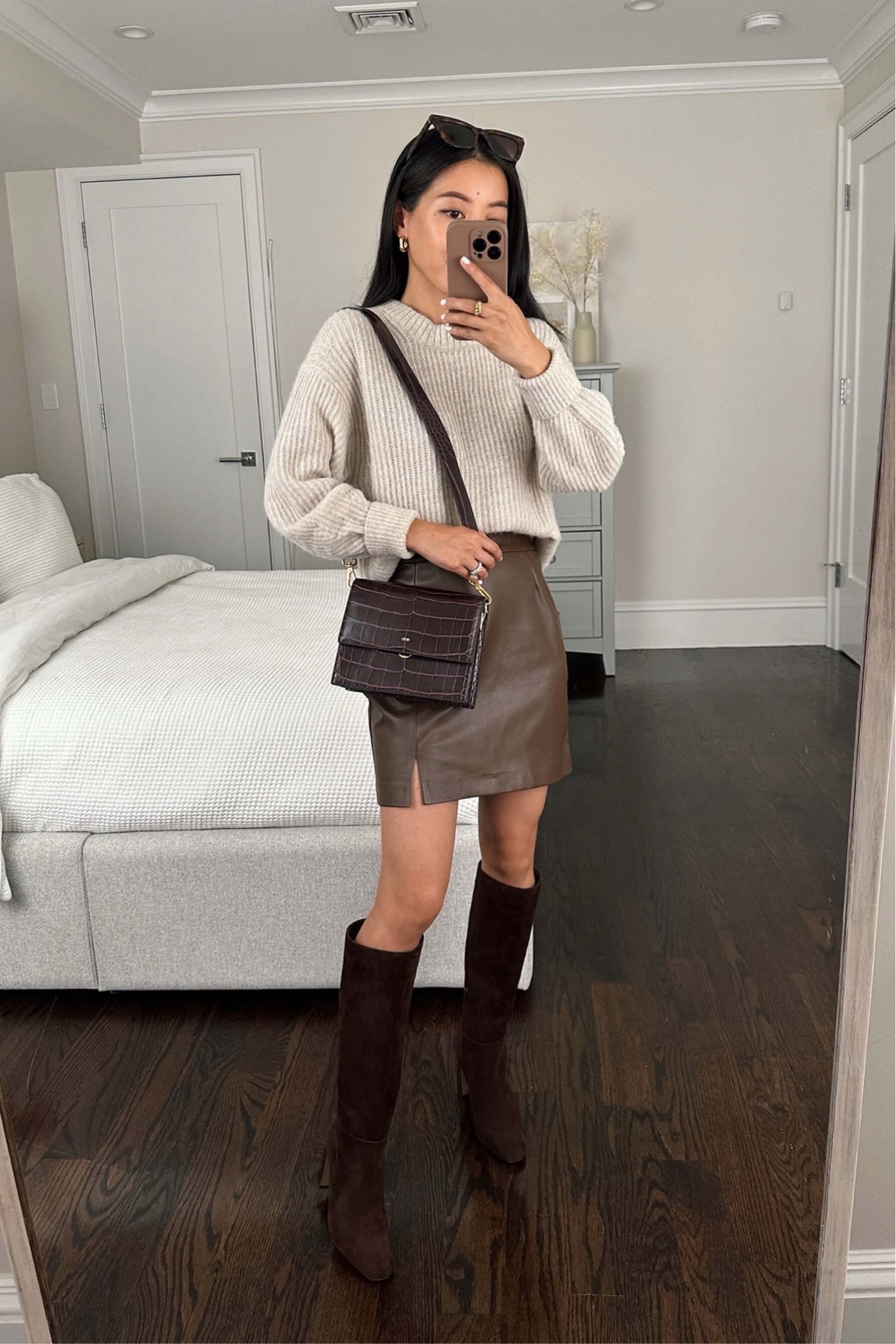 •Steve Madden boots 5.5 - love how these fit me but FYI there’s very mixed reviews! Since I bought size 5.5 and some of the reviews are for other sizes, my hunch is the shaft size increases disproportionately with each size. Size 5.5 measures: 13.25″ shaft height, and 14″ top circumference 

•Everlane sweater xxs. An old favorite with an oversized fit in the perfect neutral color. 

•Amazon the Drop faux leather mini skirt xxs, snug fit 

•$15 BP sunglasses 
•JW Pei bag

#petite fall outfit ideas chocolate brown // mini skirt + knee high boots

#LTKstyletip #LTKSeasonal