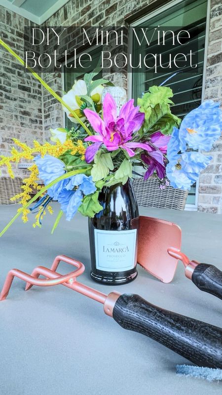 A great way to dress up a mini bottle of wine and keep the flowers as a keepsake. 
#winebottlebouquet #wine #fauxflowers #giftbadjet #giftforher

#LTKHome #LTKParties