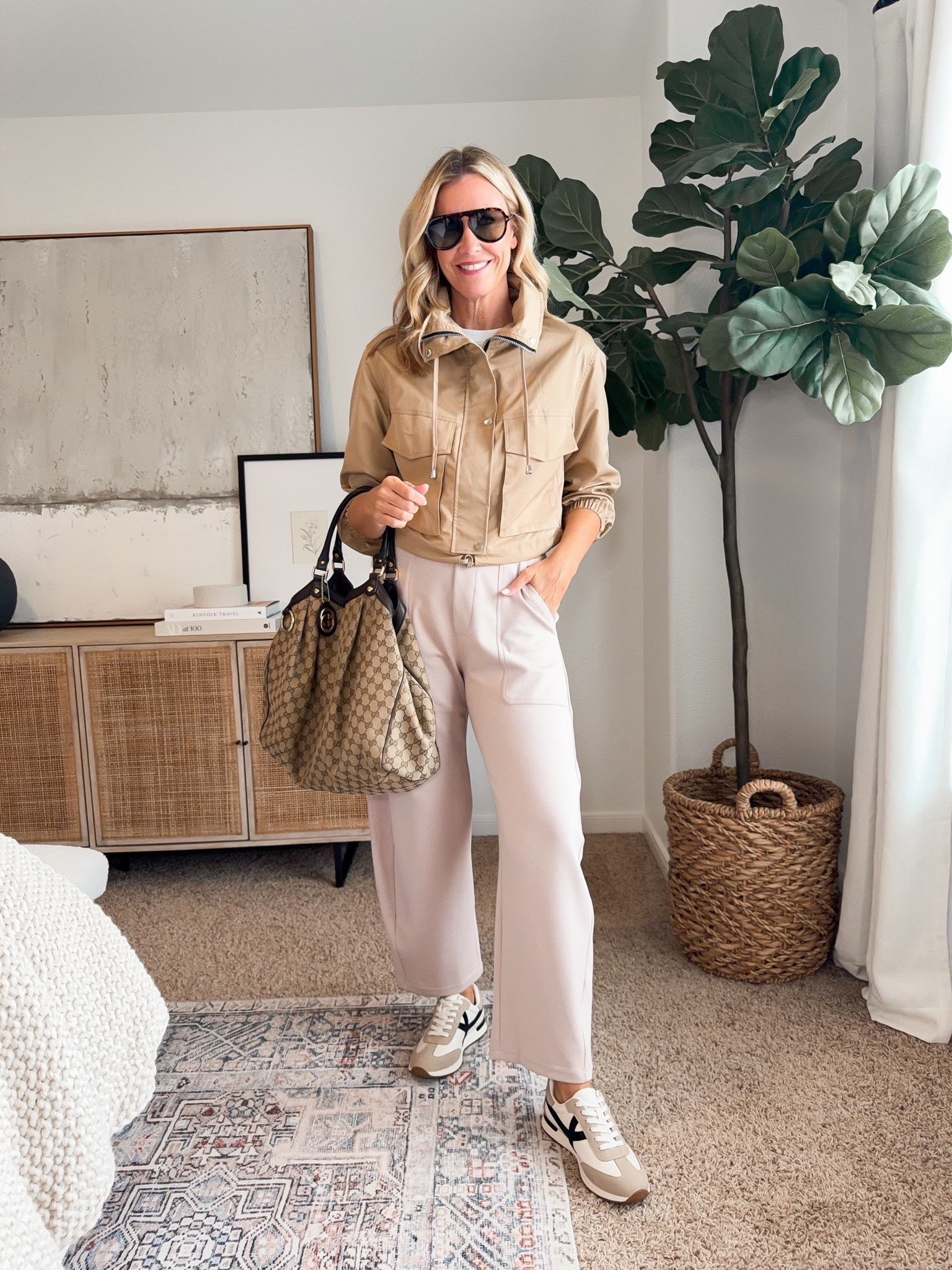 This monochromatic outfit makes neutrals feel anything but boring. The cropped utility jacket adds structure to the wide leg pants, while keeping everything in the same warm neutral palette makes the whole look feel effortless.

neutral fall outfit, utility jacket, cropped jacket, wide leg pants, monochromatic outfit, neutral fashion, casual fall style, everyday fall outfit, sneaker outfit, travel outfit, women’s fall fashion, HauteandHumid

#LTKootd #LTKSeasonal #LTKOver40