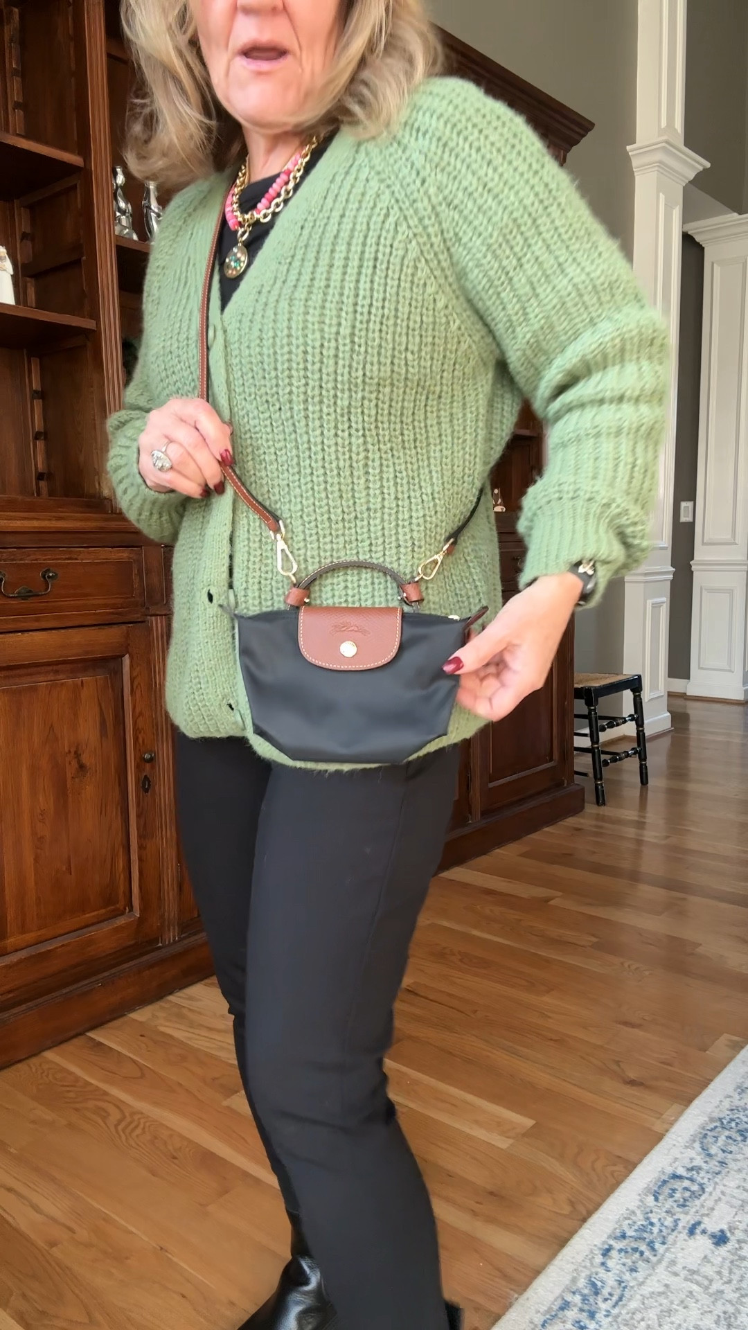 The longchamp mini pouch is totally the it bag and I had to try it. I added the Amazon strap kit that matches beautifully! 

My sweater is size large. I’d recommend sizing up for a more relaxed fit 

20% off code on my jewelry NANETTE20

Pants are just one step above a legging. Sized up to a large. They do come is caring lengths. 

Love my Chelsea boots. Wearing a 1/2 size up. Waterproof! 

Winter outfit Amazon sweater leggings ponte knit pant designer bag crossbody bag black mini bag 

#LTKWatchNow #LTKOver40 #LTKItBag
