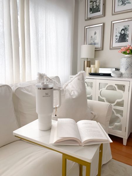 Starting the day fresh 🤍

Stanley cup, living room, white living room, couch, slipcover couch, c side table, side table, book, Stanley accessories, window curtains, curtains, white curtains, mirrored box, white cabinet, picture frame, vase, throw pillow, small living room, furniture, home decor.

#LTKHome #LTKStyleTip #LTKFindsUnder100