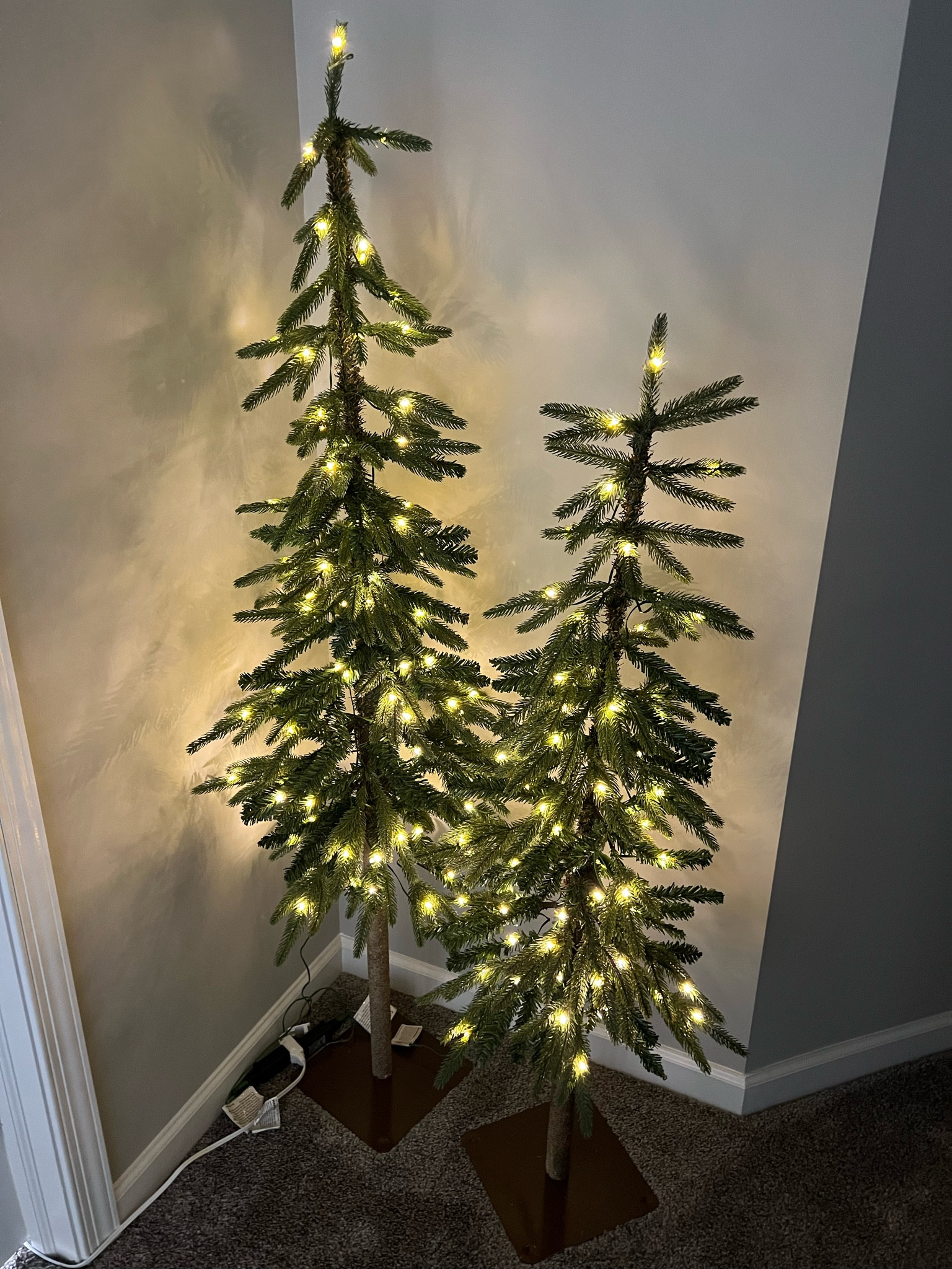 Pre-lit Christmas trees perfect for small spaces. Added these to my upstairs hallway and love them. 

#LTKHoliday #LTKSeasonal #LTKhome