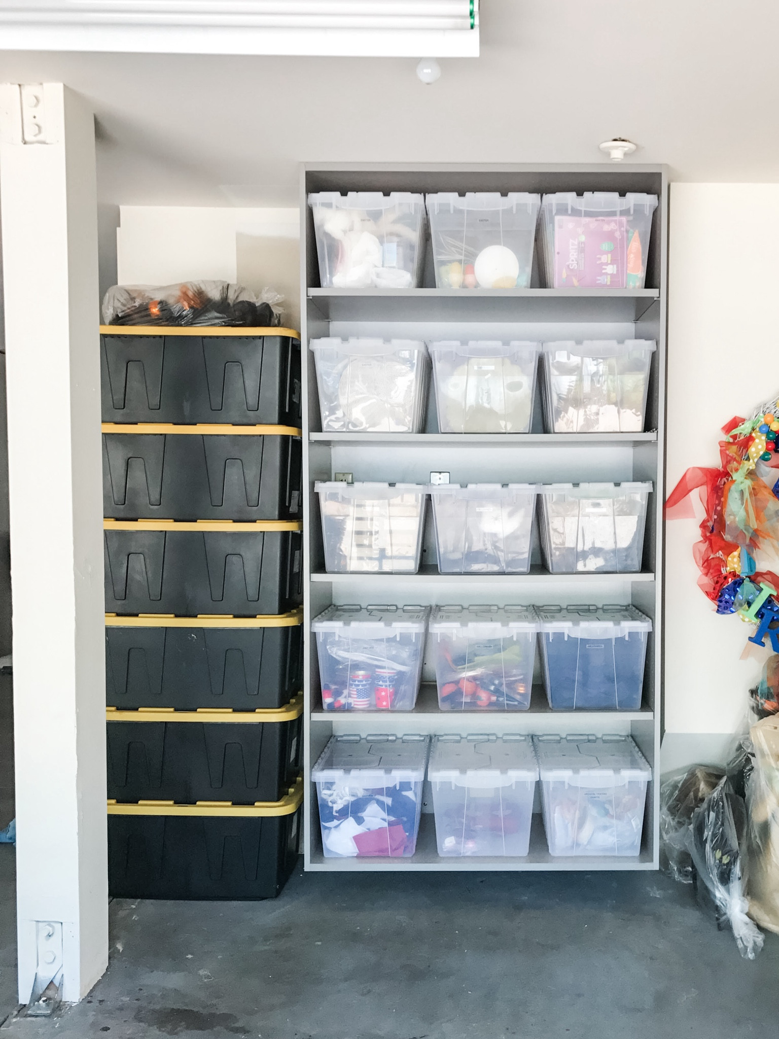 Although I have my personal favorite go to bins and containment, that doesn’t mean that it necessarily works for the spaces or contents of the families that hire me. Therefore, I do spend quite a bit of time sourcing materials that would work best for their individual situation. in this case, when I organized this garage, I was working with a very defined set of shelving that needed storage for holiday decorations. I found these hinged lid bins that fit perfectly side-by-side on the shelves. It was like they were meant to be a part of this shelving system!your best tool in organizing any space in your home will always be a measuring tape and a good solid Google search!

#LTKhome #LTKMostLoved #LTKfamily