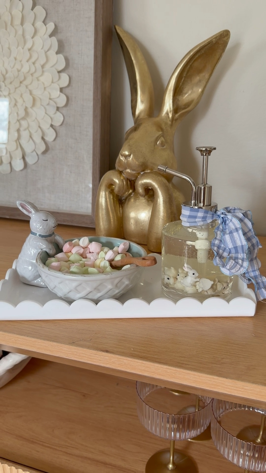 I love to jazz up my hand soap for whatever holiday is coming and for Easter I found these adorable bunnies and gingham ribbon, and paired it on this scalloped tray with my fave bunny bowl and some after-dinner mints! Perfect for any powder room🤍

#LTKHome #LTKSeasonal