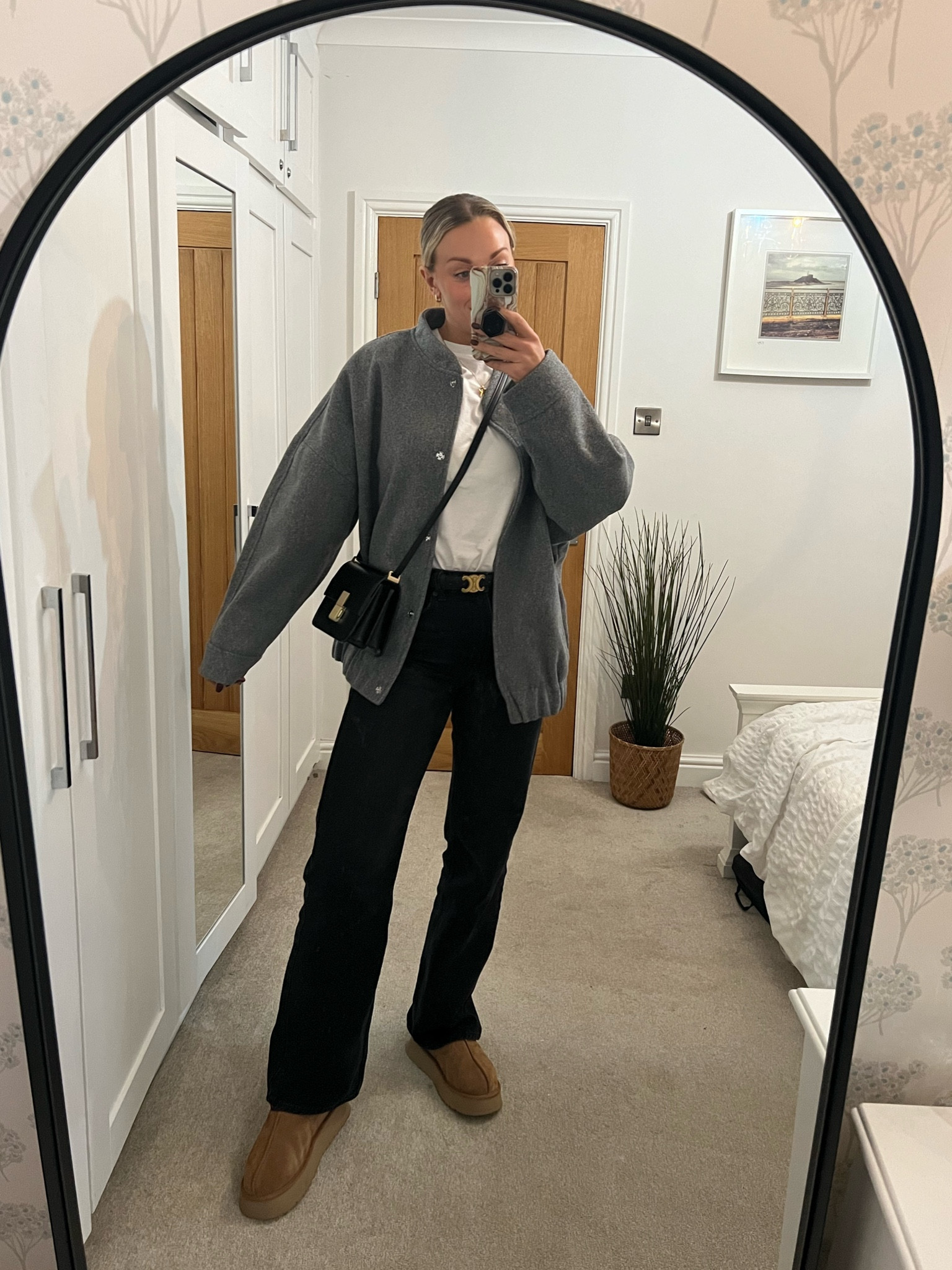 Grey bomber jacket, white boxy T-shirt, black straight leg, tall long jeans. UGG Taz chestnut 

#LTKstyletip #LTKSeasonal #LTKmidsize