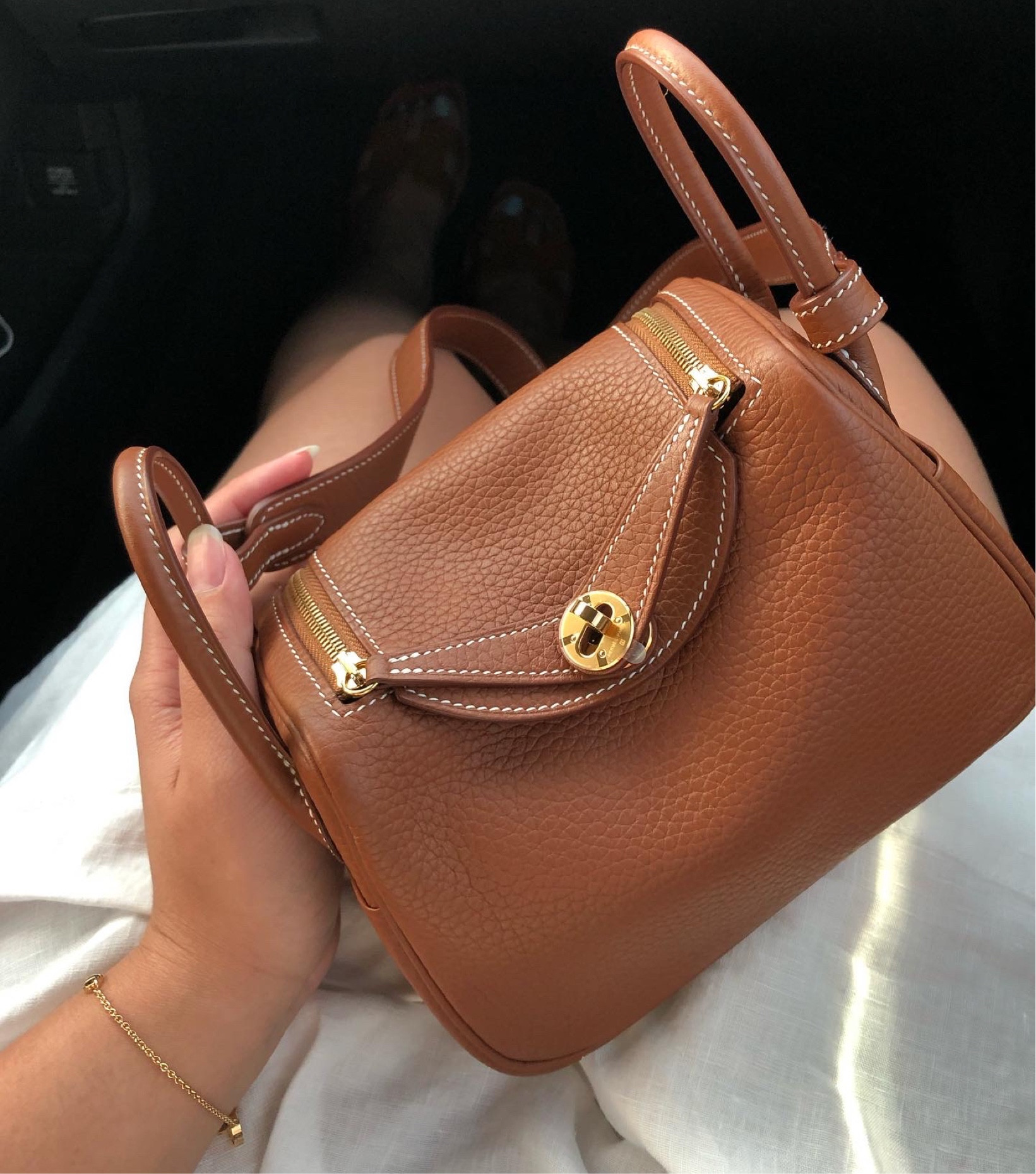 Hermès Mini Lindy Gold GHW❤️
This has quickly become my go-to and favorite bag! It can pack so much and it’s such a unique design, the leather is butter smooth to touch too😻

#LTKtravel #LTKstyletip #LTKU