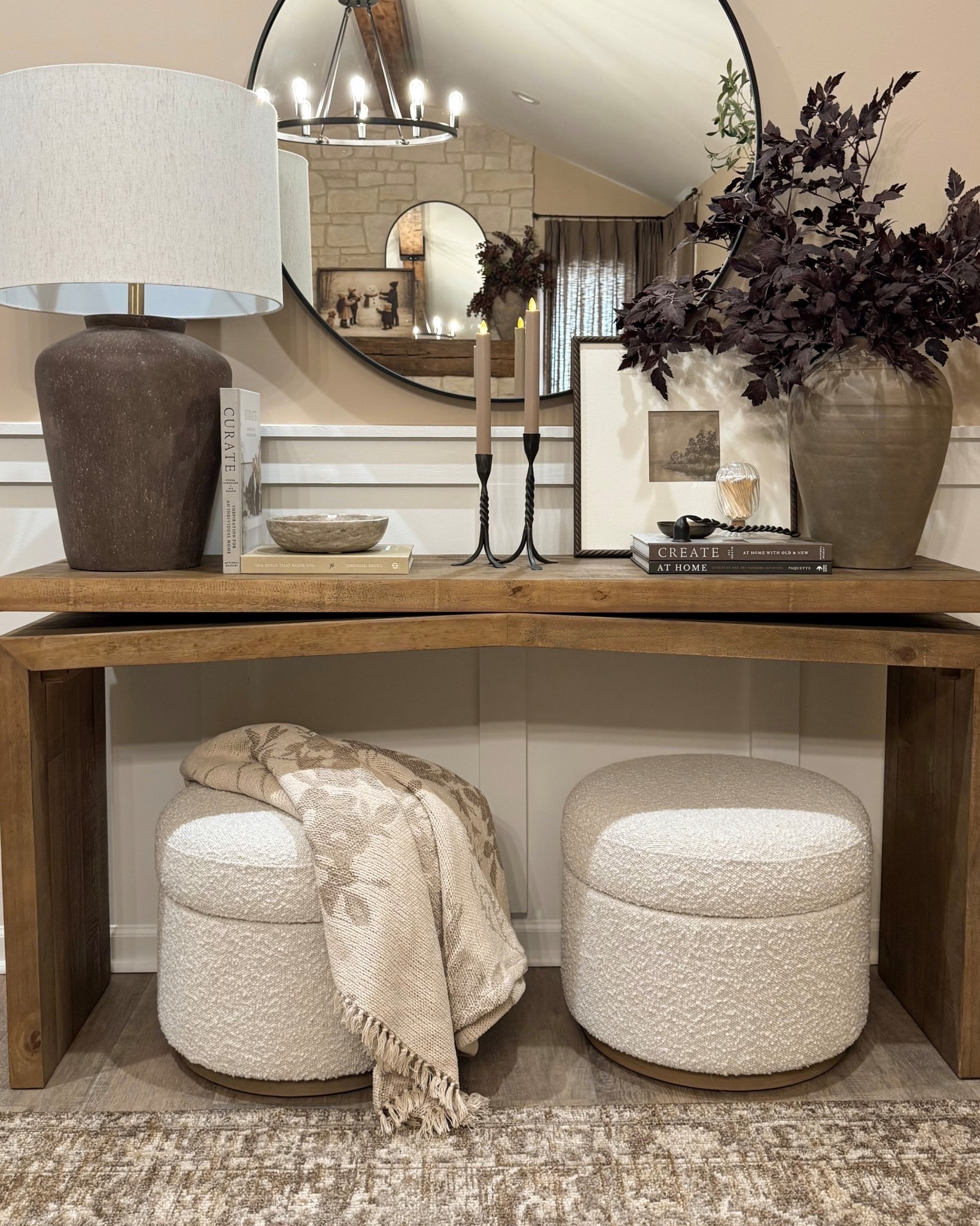 Cozy, console moment. ✨

This cozy moment is all about warm neutrals and layered texture — from the sculptural table lamp to the oversized vase moment and those boucle ottomans tucked underneath for extra seating (and hidden storage!).

Follow @farmtotablecreations on Instagram for more cozy home finds and everyday styling inspiration.

#livingroomdecor #consoledecor #nestingtables #homedecor #neutralhome #tablelamp #vase #ottoman #coffeetabledecor #livingroomfurniture #pillows #rugs

#LTKSeasonal #LTKHome #LTKSaleAlert