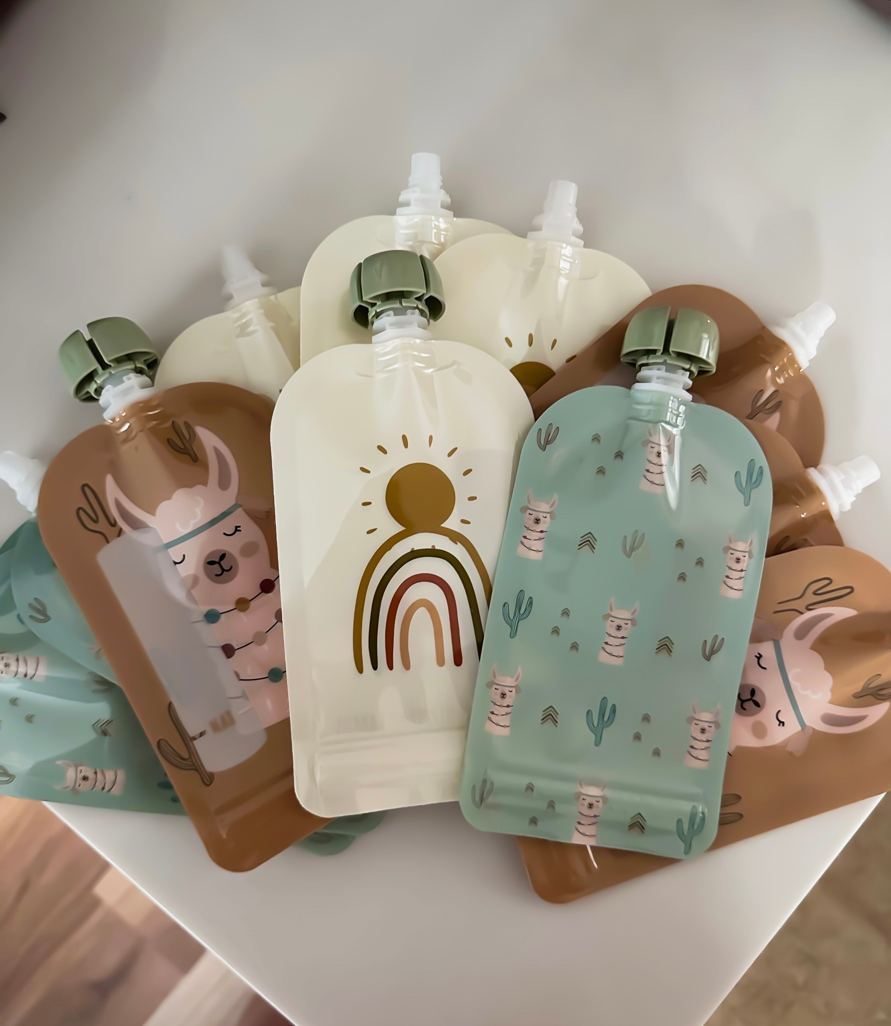 Cutie reusable pouches! Perfect for yogurt and applesauce on the go, and a lifesaver for car rides, beach days, or other adventures this summer with your little ☀️ 

#LTKSummerEdit #LTKKids #LTKBaby