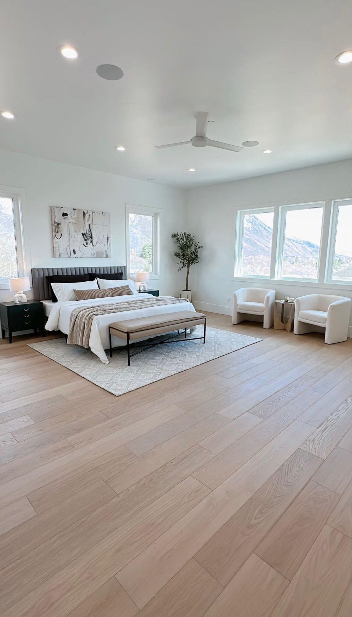 Primary bedroom 
Headboard, art, rug, accent chair, side table, interior styling, faux olive tree, nightstands, decor, home staging 

#LTKsalealert #LTKhome #LTKstyletip