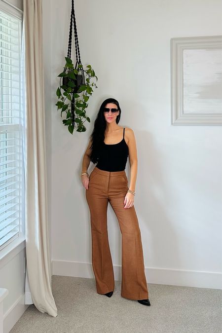 The most comfortable flannel wool/tweed trousers ever! Love the retro 70s vibe. Pockets & elongating 👌🏽
Tuckable bra cami size Medium. Tuckable bra tank | wide leg high rise wool trousers Size 4 Long

#LTKstyletip #LTKSeasonal #LTKfindsunder50