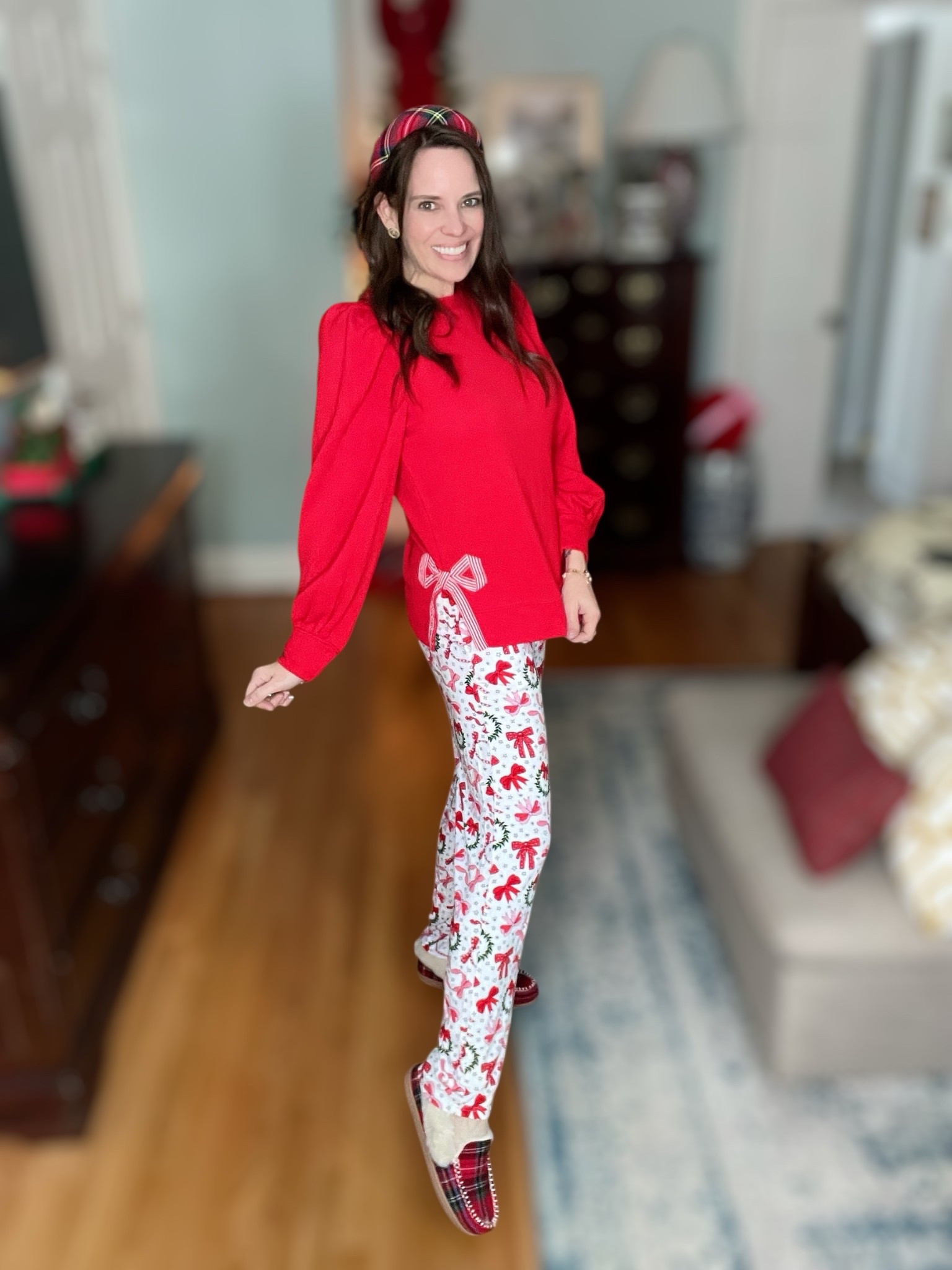 Cozy Christmas Morning Vibes ❤️🎄

The comfiest holiday moment — curled up in my Bow What Fun pajama pants from Caden Lane with my favorite tartan Dearfoams slippers. These pants are SO soft and festive, and the print is even cuter in person! I paired them with a simple red top and let the cozy Christmas background do the rest.

Such an easy, comfy look for wrapping gifts, baking cookies, or lounging by the tree. Caroline’s matching nightgown sold out, but I linked a darling Amazon dupe that coordinates perfectly with this bow print. If you love red + white Christmas pajamas, these are a must!

christmas pajamas • cozy holiday lounge • caden lane pajamas • bow print sleepwear • holiday slippers • dearfoams tartan • comfy christmas outfit • matching family pajamas • festive pjs • holiday home vibes

#LTKCyberWeek #LTKGiftGuide #LTKHoliday

#LTKHoliday #LTKCyberWeek #LTKGiftGuide