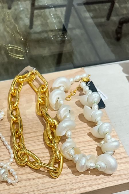 Shell necklaces and sea inspired jewelry are everywhere. I can honestly say the Tuckernuck shell necklace is a phenomenal option. The J.Crew necklace is more subtle, but the Tuckernuck makes a statement. 

#LTKStyleTip #LTKSummerSales #LTKFindsUnder100