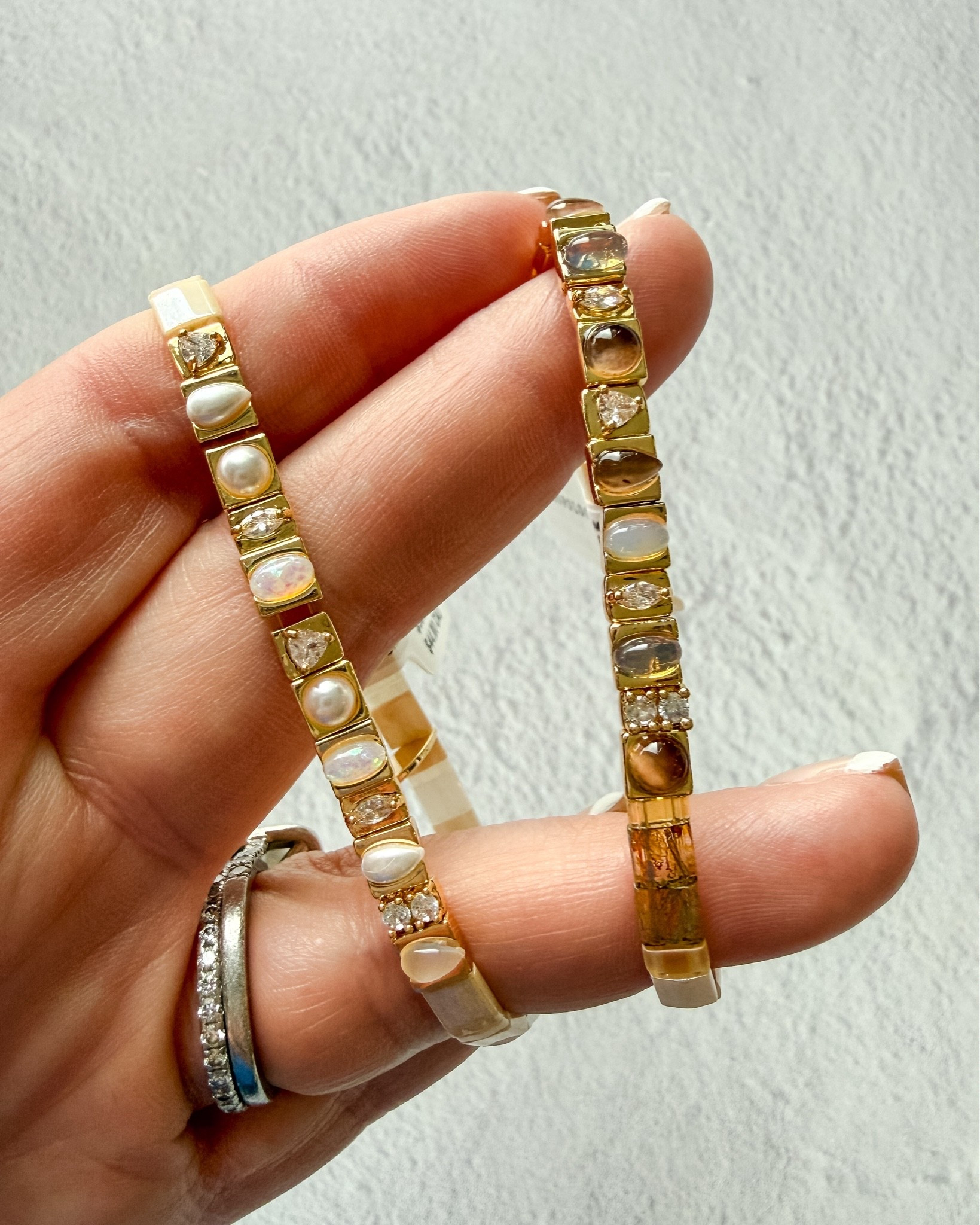 These Anthro tiled gemstone bracelets look so high end stacked and layered for the summer and they come in tons of colors!  I grabbed them in these two different cream and neutral shades.

#LTKootd #LTKSeasonal